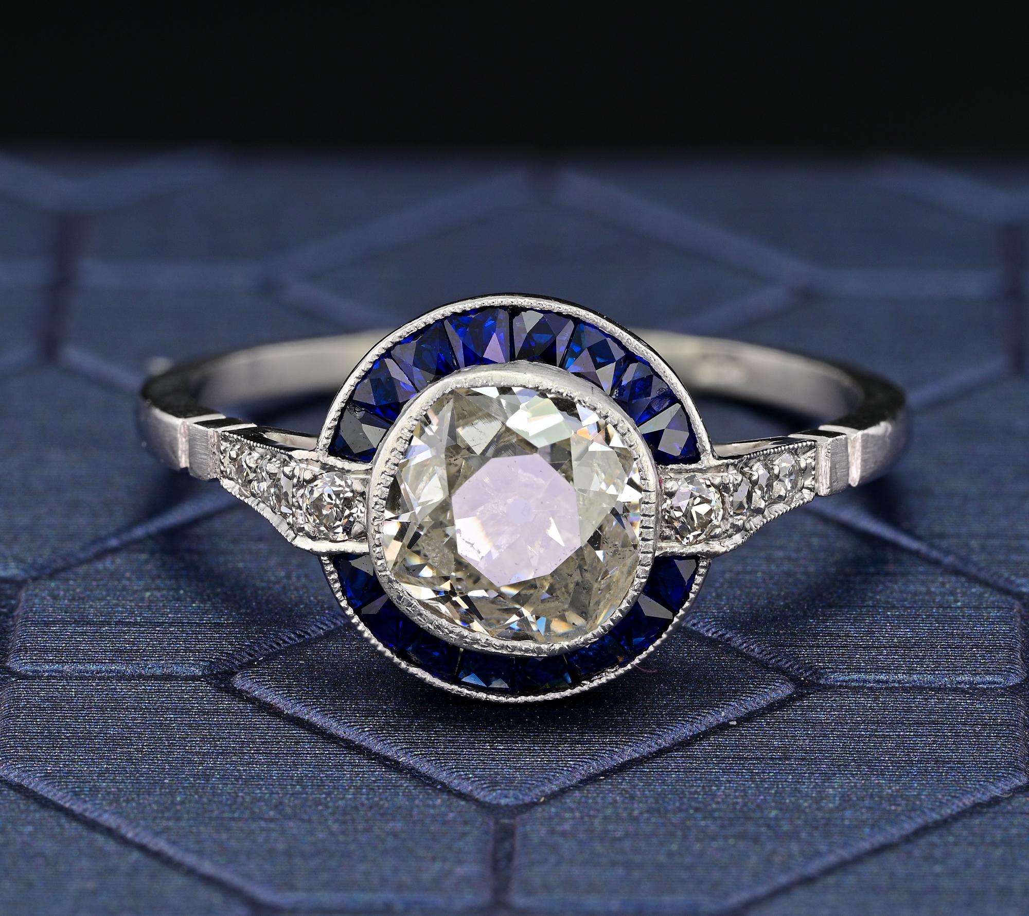 This stunning Art Deco Style ring has been totally hand crafted of solid Platinum
Delightful target style, so elegant and timeless, superbly made throughout
Centrally set with  a bright white antique old mine chunky cut Diamond of 1.10 Ct – antique