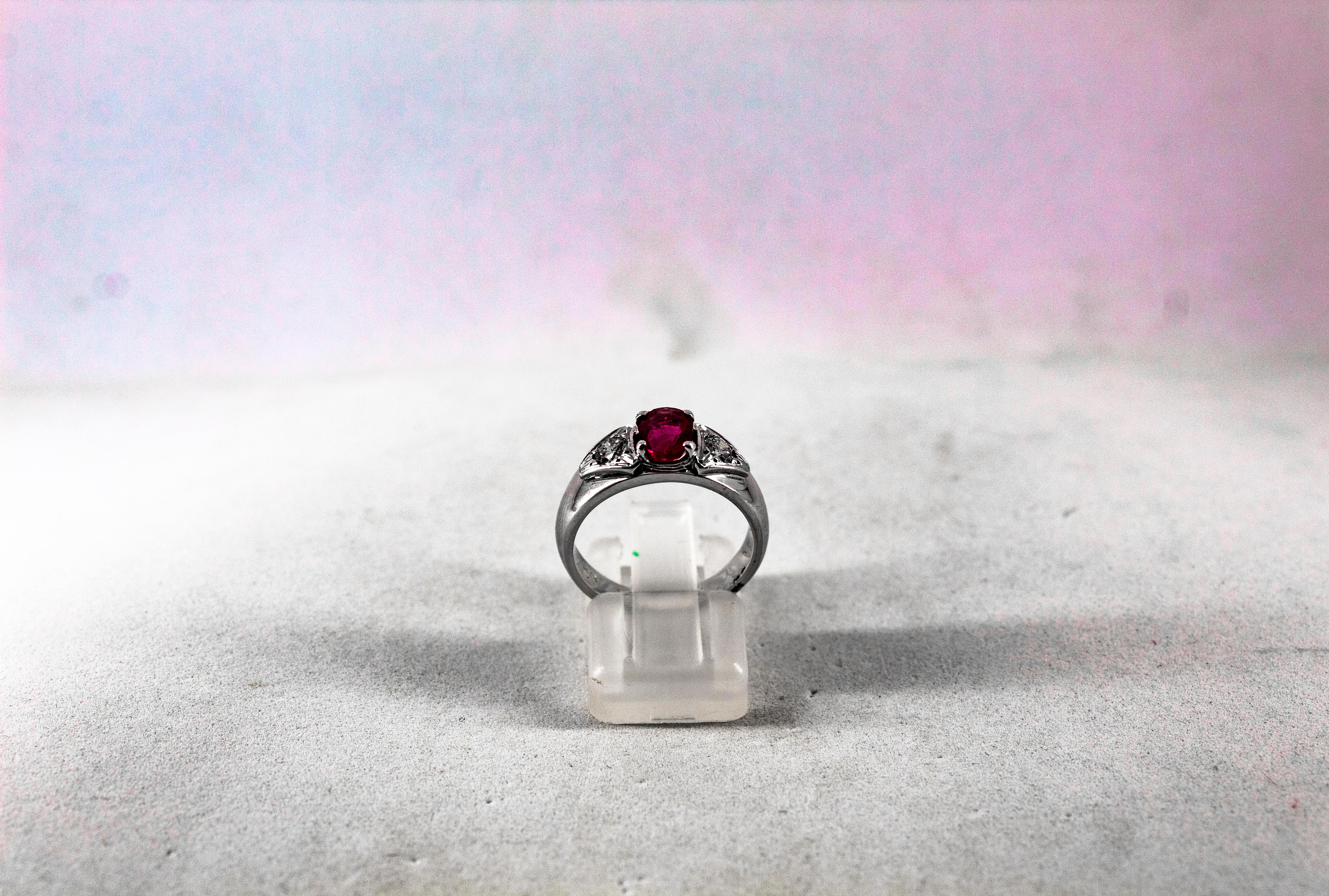 This Ring is made of 18K White Gold.
This Ring has 0.30 Carats of White Brilliant Cut Diamonds.
This Ring has a 0.80 Carats Oval Cut Ruby.
Size ITA: 12 USA: 6

We're a workshop so every piece is handmade, customizable and resizable.