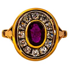 Anillo de cóctel de oro amarillo con diamante blanco talla oval de 1.15 quilates y rubí estilo art déco