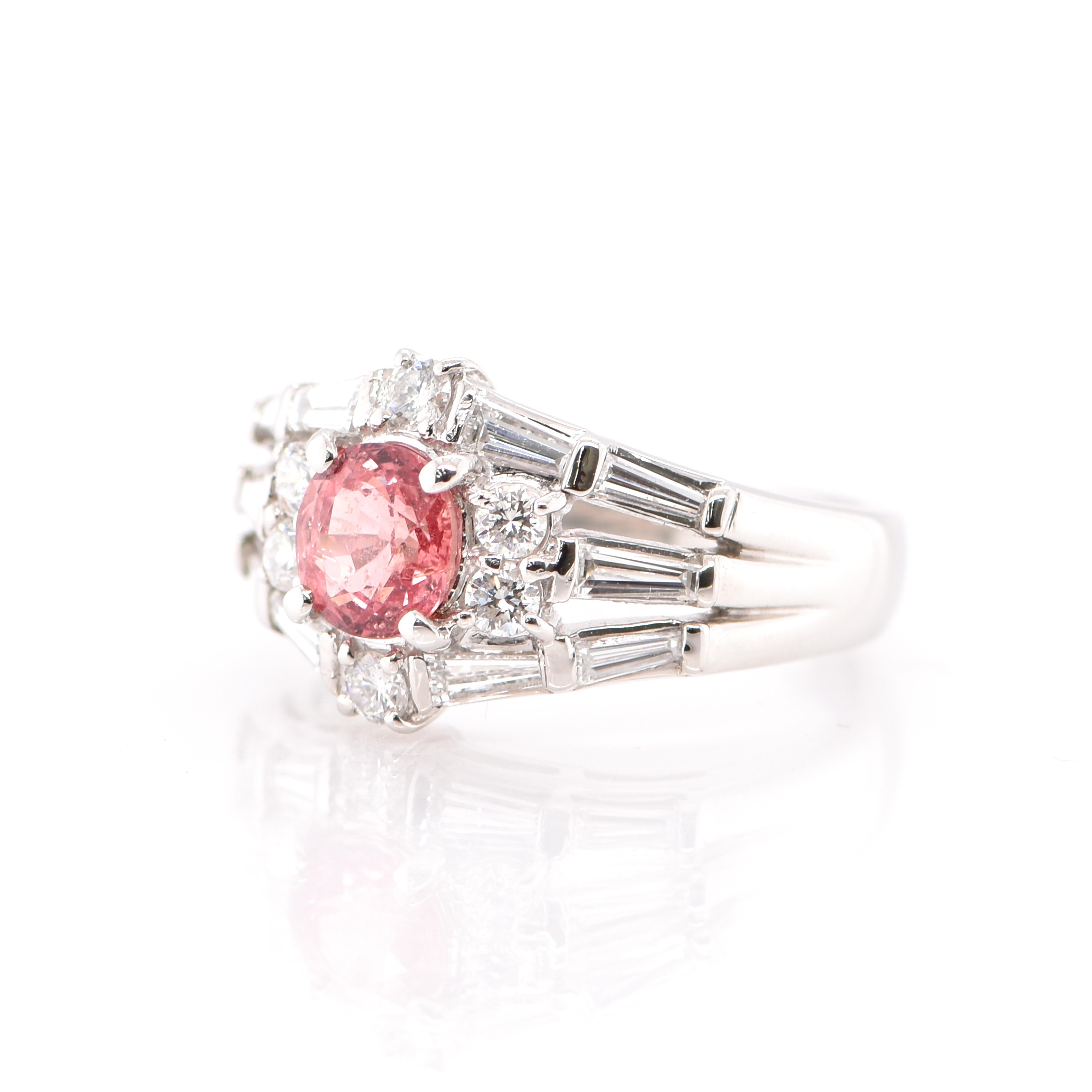 A beautiful ring featuring a 1.17 Carat Padparadscha Sapphire and 0.90 Carats of Diamond Accents set in Platinum. Sapphires have extraordinary durability - they excel in hardness as well as toughness and durability making them very popular in