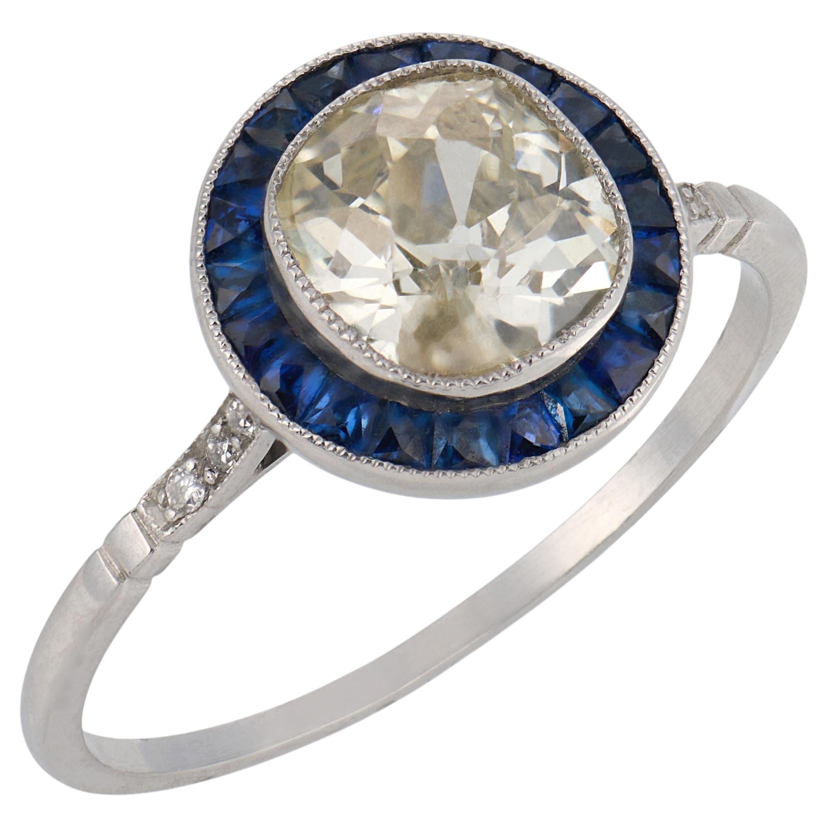 Art Deco style 1.26 carat old mine cut diamond sapphire platinum target ring