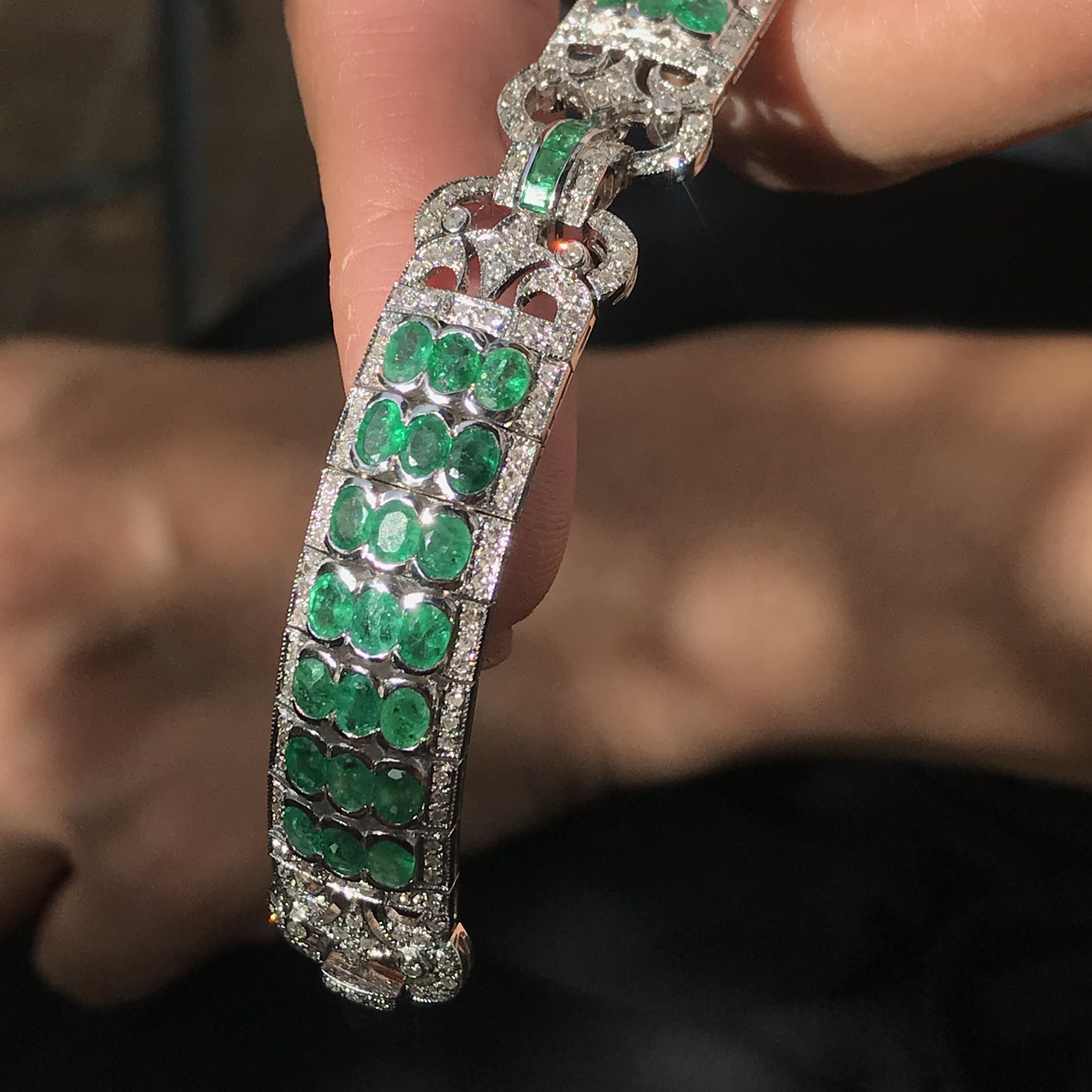 This Art Deco inspired oval and square natural emerald bracelet and diamond in 18k white gold accentuates its unique shapes though shimmering light, paying homage to the past and defining the future simultaneously. The bracelet features 12.89