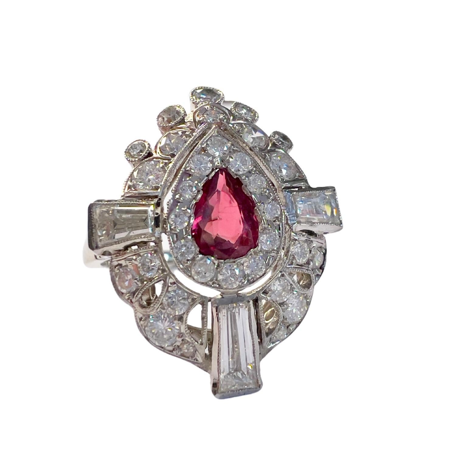 Elegant art deco-style ring crafted in Platinum 950, featuring brilliant- and trapeze-cut diamonds with a striking pear-shaped ruby. A classic piece with refined vintage charm.

Technical details:

Metal: Platinum 950
Total weight: 5.02
