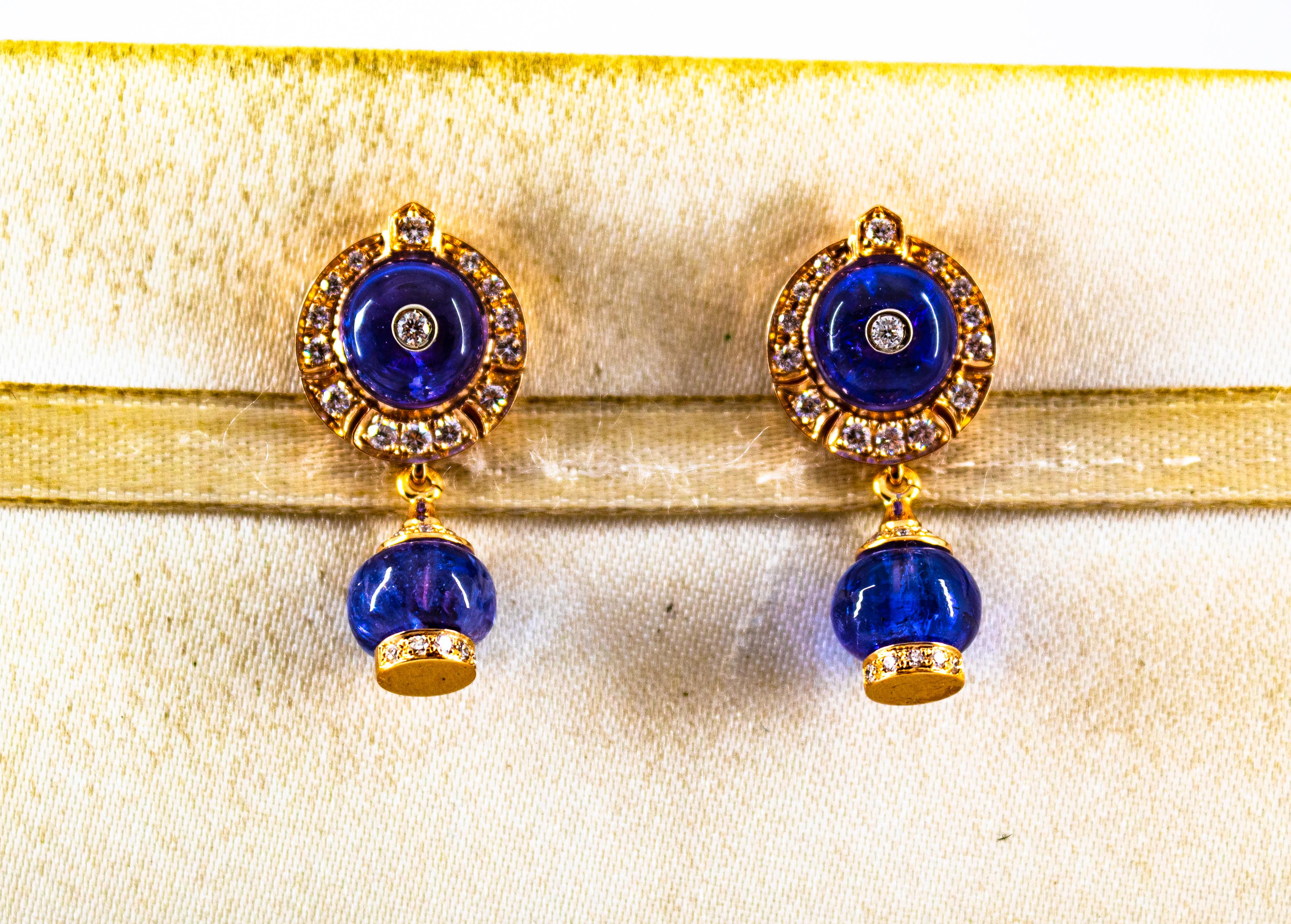 These Earrings are made of 14K Yellow Gold.
These Earrings have 0.45 Carats of White Brilliant Cut Diamonds.
These Earrings have 14.00 Carats of Natural Tanzanite.

These Earrings are available also with Opals or in White Gold.

All our Earrings