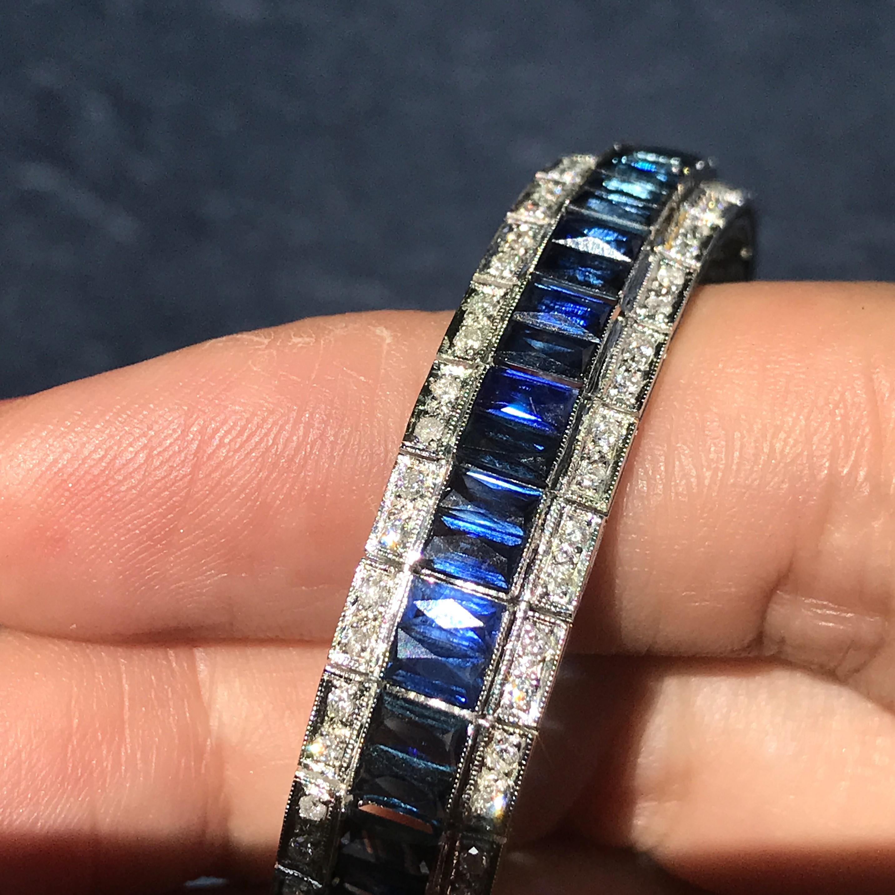 Antique 20th Century Art Deco style exceptional Sapphire and Diamond White Gold bracelet, designed as three rows set with 148 round brilliant cut diamonds and 74 French cut sapphires. The quality of craftmanship, clarity and color of the stones is