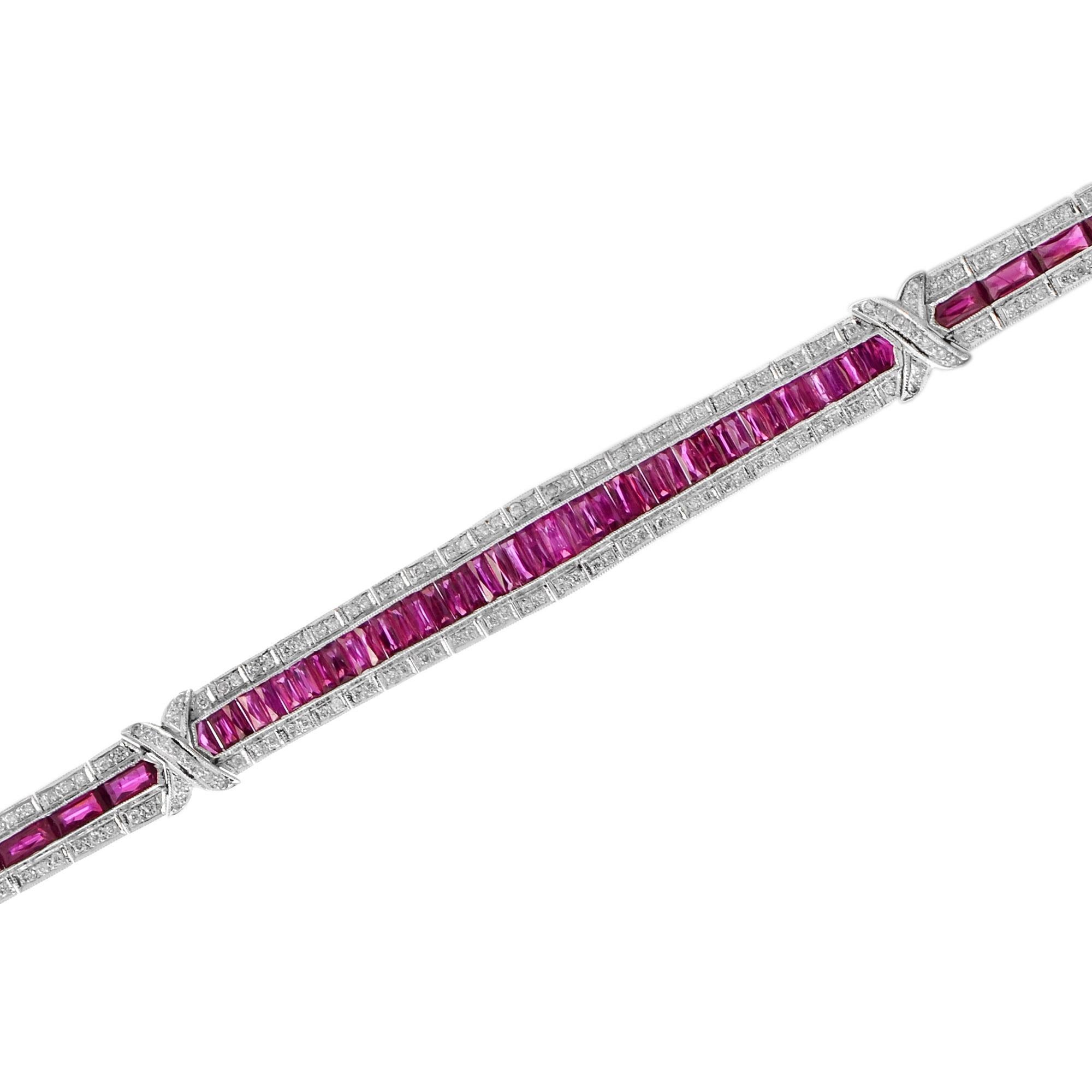 This stunning Art Deco Style ruby and diamond18k  white gold link bracelet features 242 round brilliant cut diamonds. 66 rectangular French cut rubies break up the two sections of diamonds, adding a beautiful design and pop of bright color! A truly