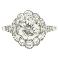Art Deco Style 1.58 Carat Old European Diamond Engagement Ring Oval Halo Flower
