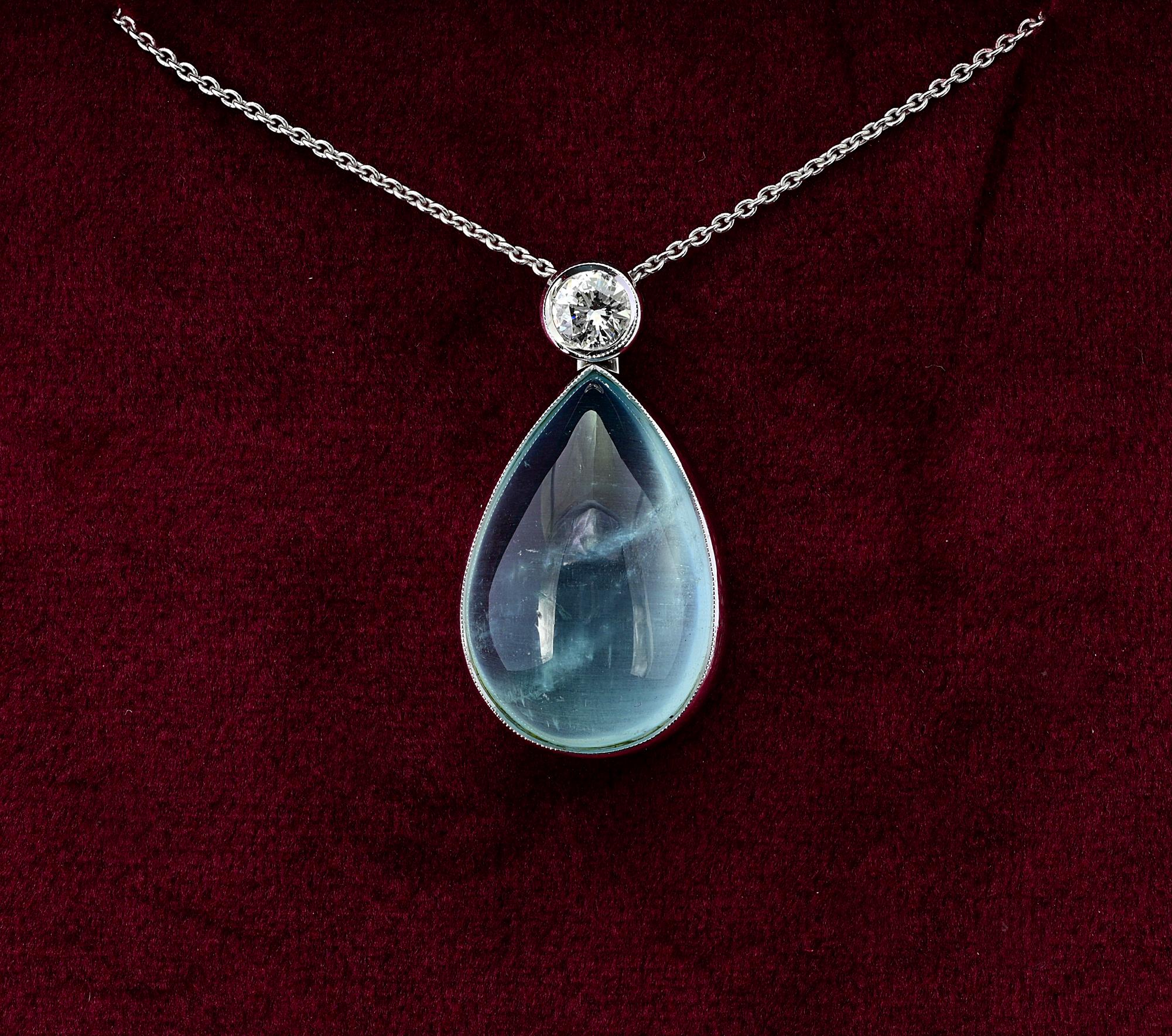 This beautiful Art Deco Style Aquamarine & Diamond drop pendant has been hand crafted of solid 18 KT gold in a classy, timeless design – matched with a 18 Kt solid gold chain which slides from the top
Aquamarine is a large 17.80 Ct (21.87 x 14.4