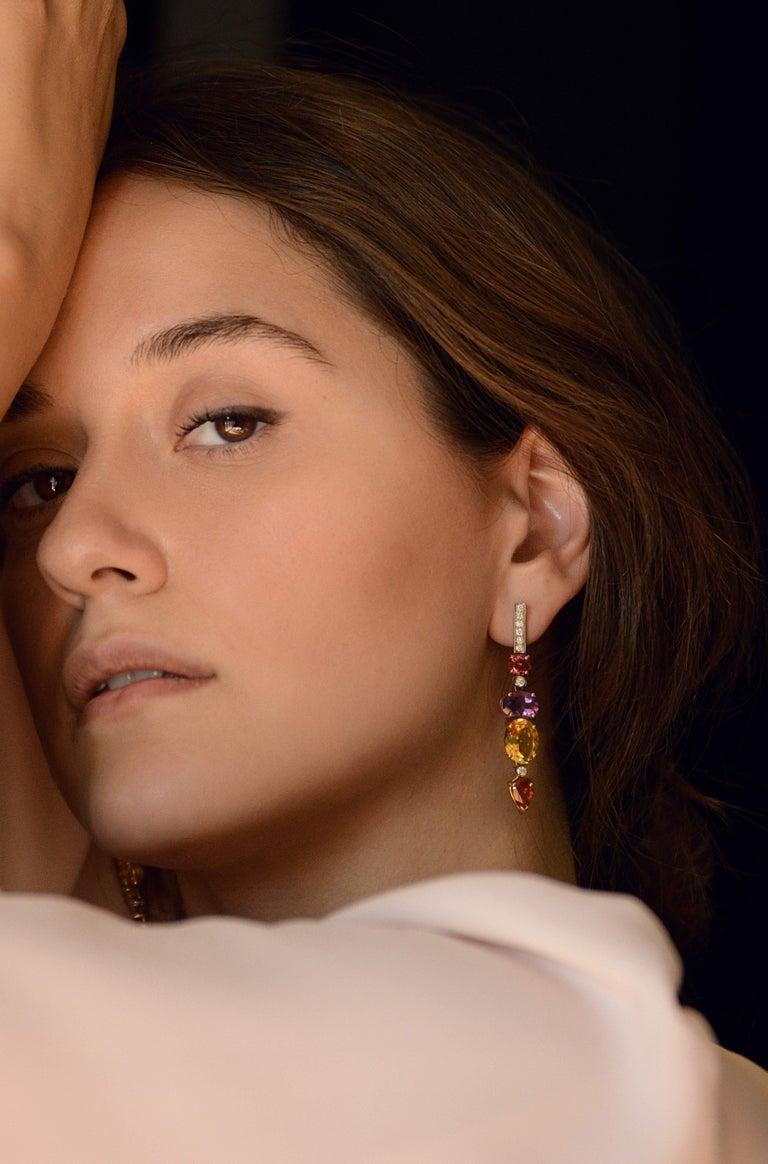 Rossella Ugolini Deco Style Collection 18 Karat Gold 0.44 Karat White Diamonds Amethyst Citrine Earrings
This Sunshine earrings, shine with their own light: the particular cut of the surface of the gems of which they are composed shines under the