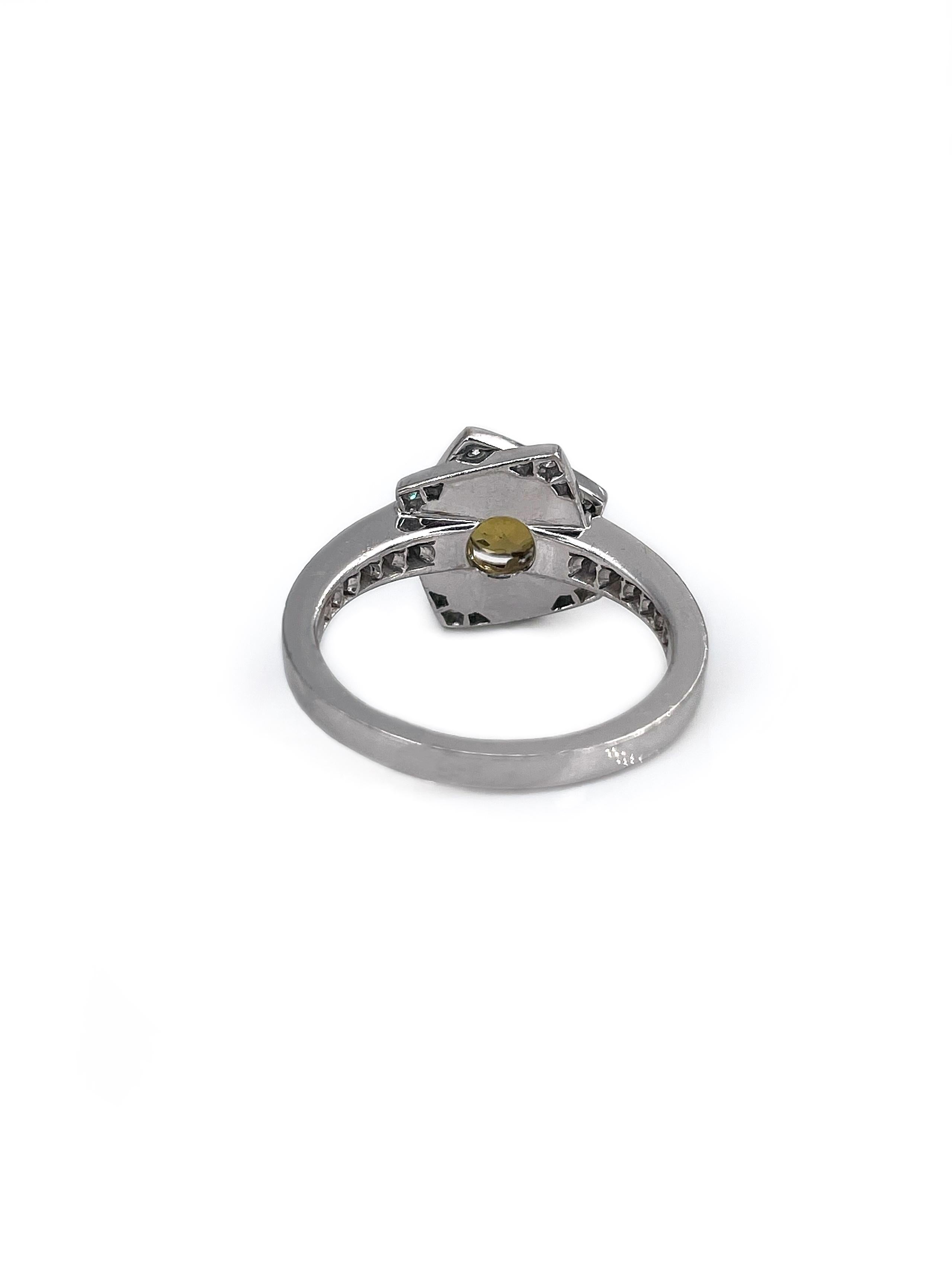 This is an Art Deco style ring crafted in 18K white gold. The piece features beautiful round yellow orange natural sapphire (1.00ct, Y6/5, VS). The gem is accompanied with 40 brilliant cut diamonds (TW 0.50ct, RW, VS). 

Weight: 5.79g
Size: 16.5 (US