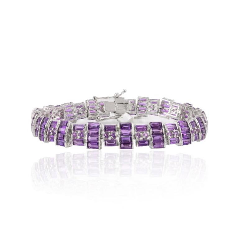 Art Deco Style 19.45 CTW Amethyst Sterling Siler Bracelet in sterling silver showcases endlessly sparkling natural amethyst, weighing 19.45 carat. It measures 7 inches long in length.
Amethyst stimulate concentration and reduces stress. 
Designed