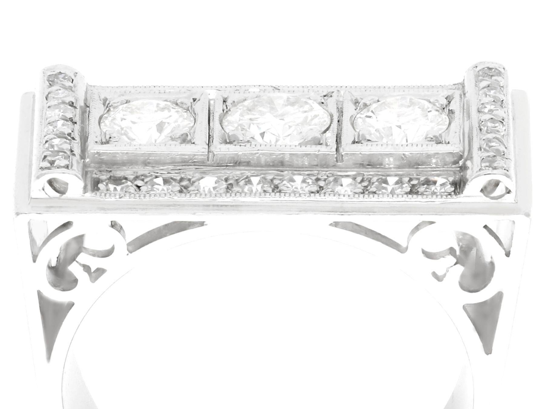 A stunning vintage Art Deco style 1.89 carat diamond and platinum cocktail ring; part of our diverse vintage jewelry and estate jewelry collections.

This stunning, fine and impressive rectangular diamond ring has been crafted in platinum.

The