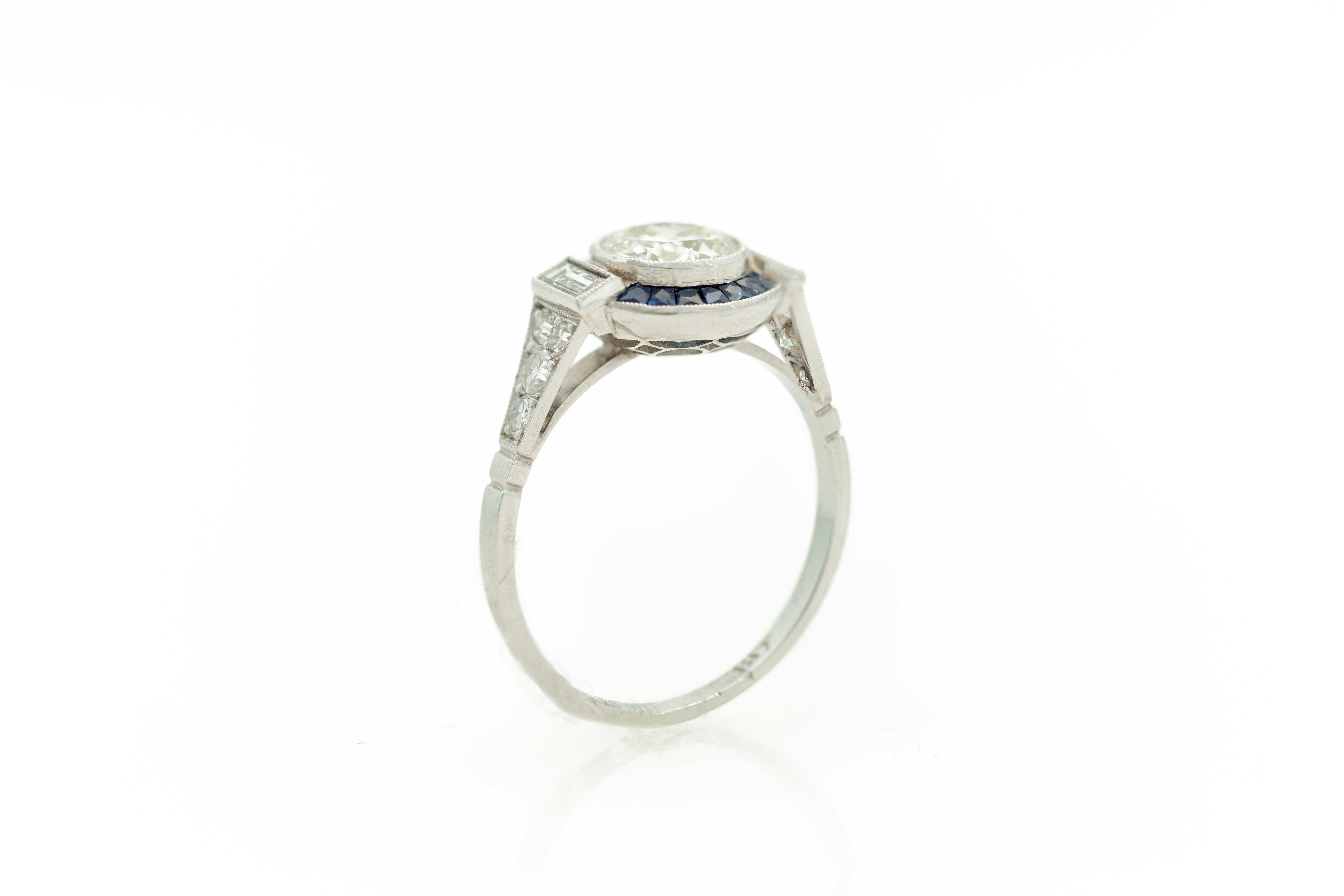 Old European Cut Art Deco Style 1960s 1.11 Carat Diamond Ring with Sapphire Halo in Platinum