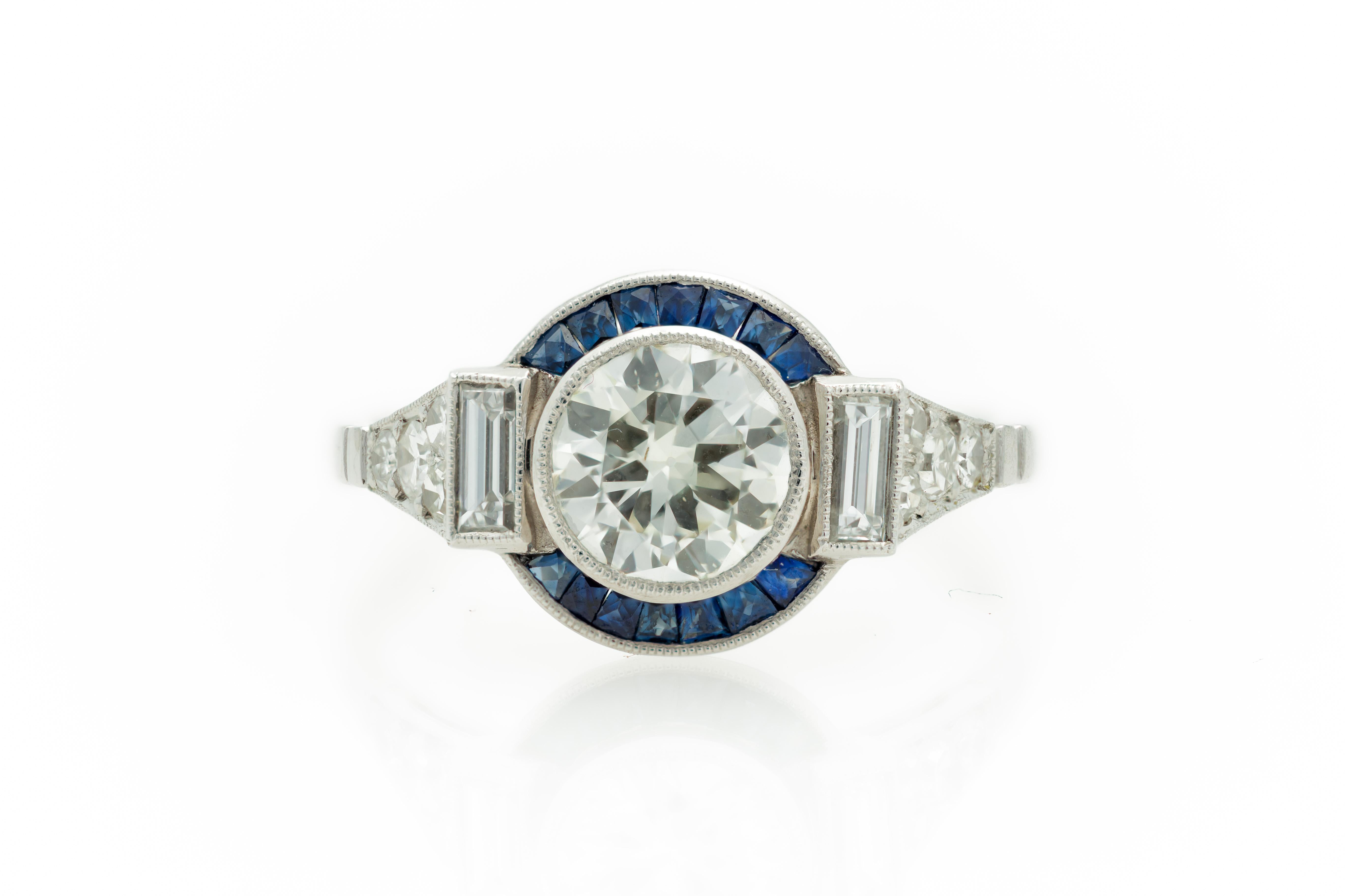 Art Deco Style 1960s 1.11 Carat Diamond Ring with Sapphire Halo in Platinum In Good Condition In Miami, FL