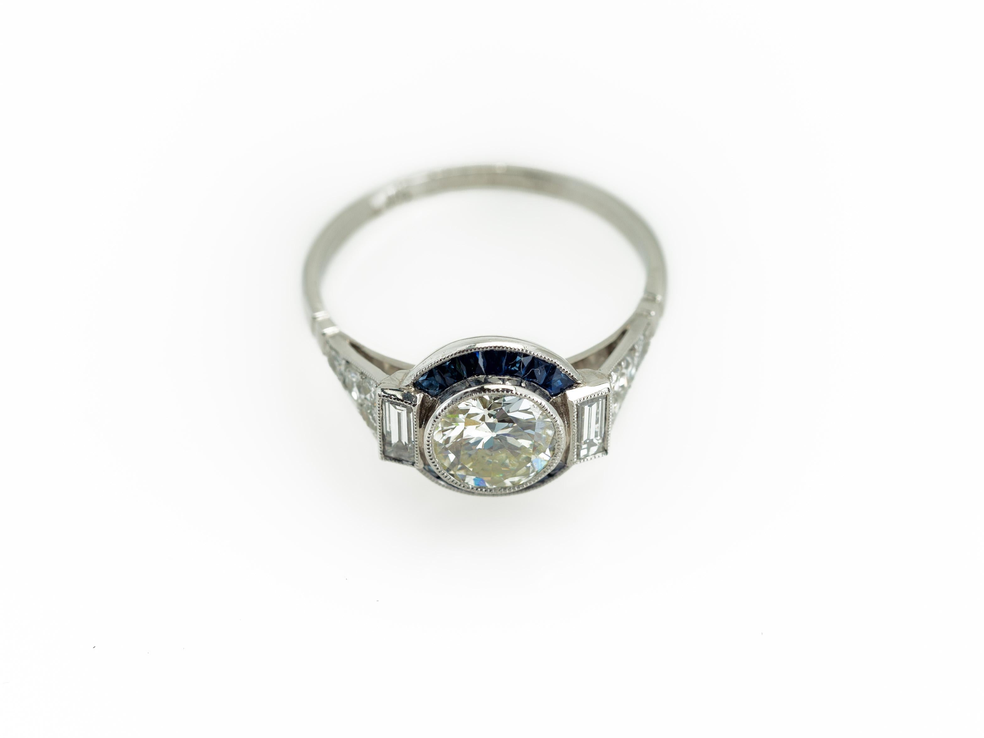 Art Deco Style 1960s 1.11 Carat Diamond Ring with Sapphire Halo in Platinum 4