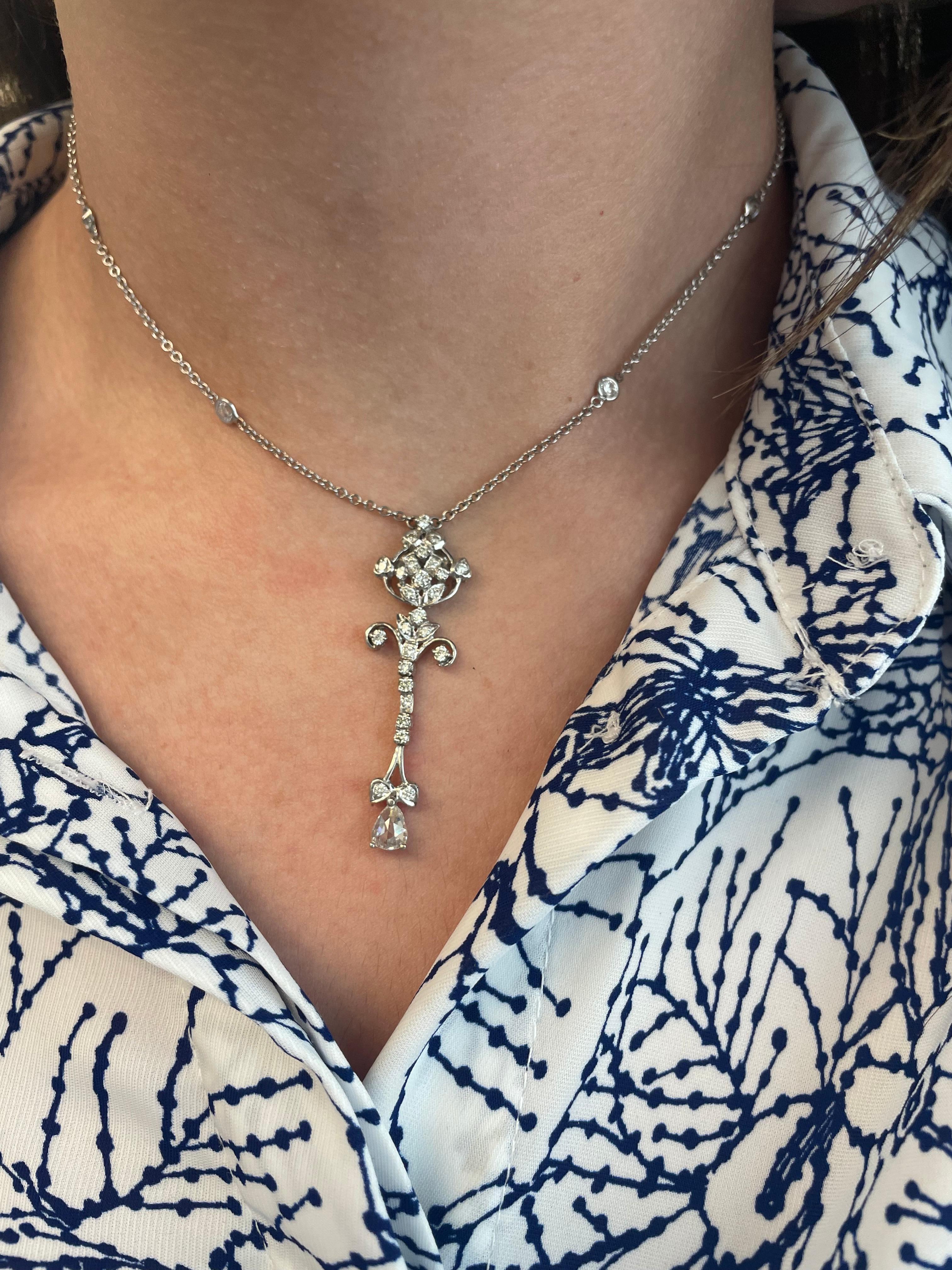 Art Deco inspired diamond drop necklace.
1.97 carats of pear and round diamonds, approximately H/I color and SI clarity. 18-karat white gold.
Accommodated with an up to date appraisal by a GIA G.G. upon request. please contact us with any