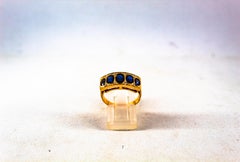 Gelbgoldring im Art-déco-Stil mit 2.10 Karat weißem Diamanten im Ovalschliff und blauem Saphir