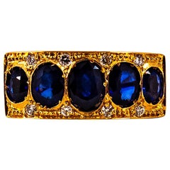 Art Deco Style 2.10 Carat White Diamond Oval Cut Blue Sapphire Yellow Gold Ring