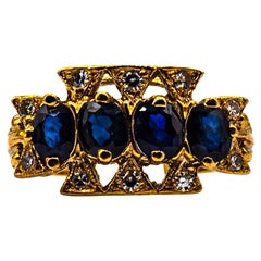 Vintage Art Deco Style 2.20 Carat White Diamond Oval Cut Blue Sapphire Yellow Gold Ring