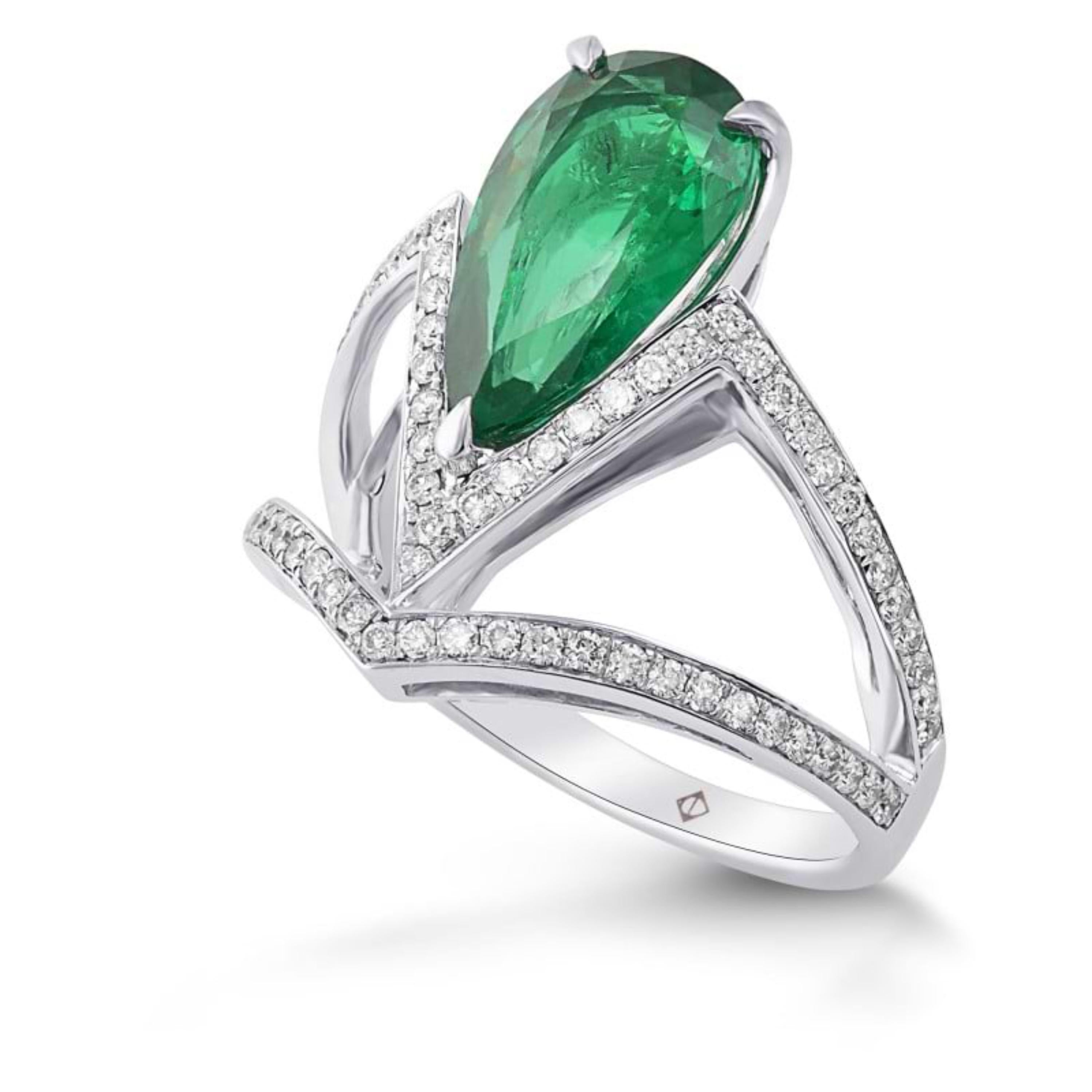 Art Deco Style 2.55 Carat Pear Cut Natural Emerald Diamond Cocktail Ring Band

A stunning ring featuring IGI/GIA Certified 2.55 Carat Natural Emerald and 0.42 Carat of Diamond Accents set in 18K Solid Gold.

Emeralds are highly valued for their