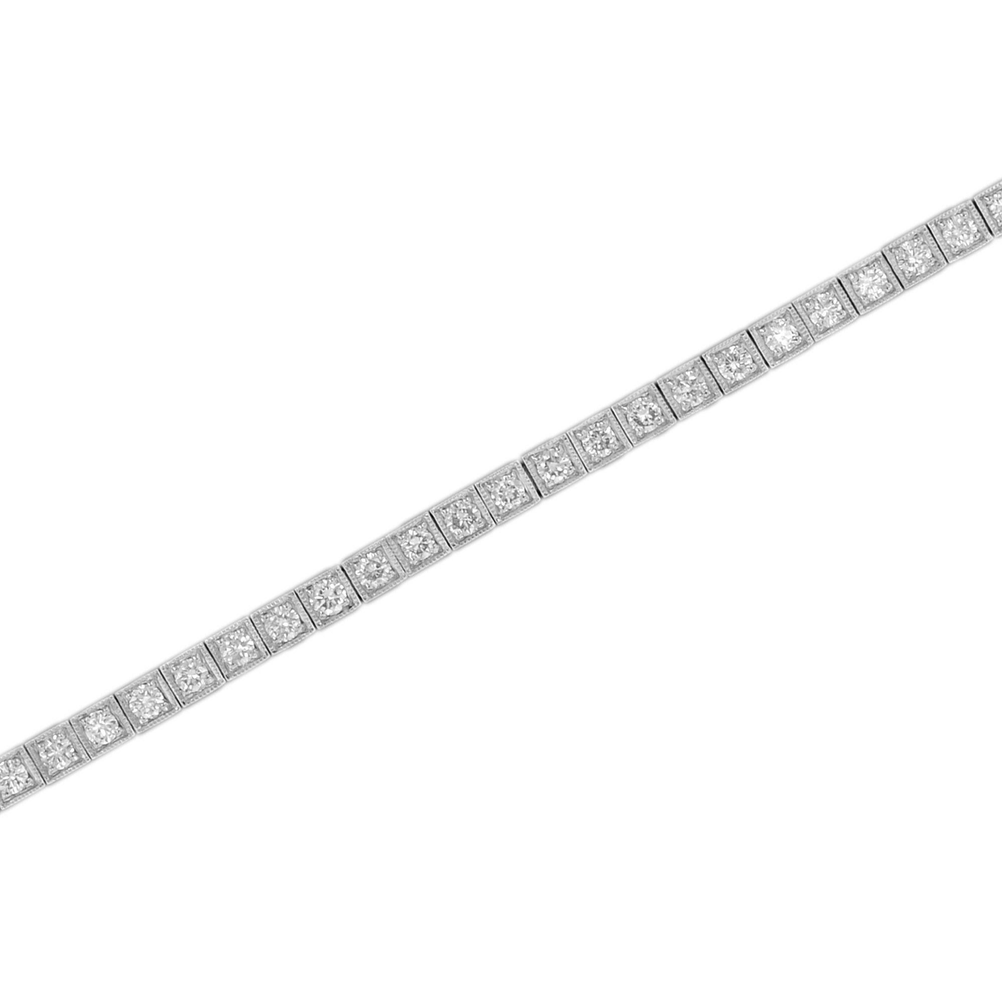 Handcrafted out of stunning diamonds, this bracelet is perfect for evening or day wear. Each individual section features round diamonds. This wonderful piece is a must-have for any Art Deco fanatic! 14K White Gold. 
Bracelet Information
Width: 7
