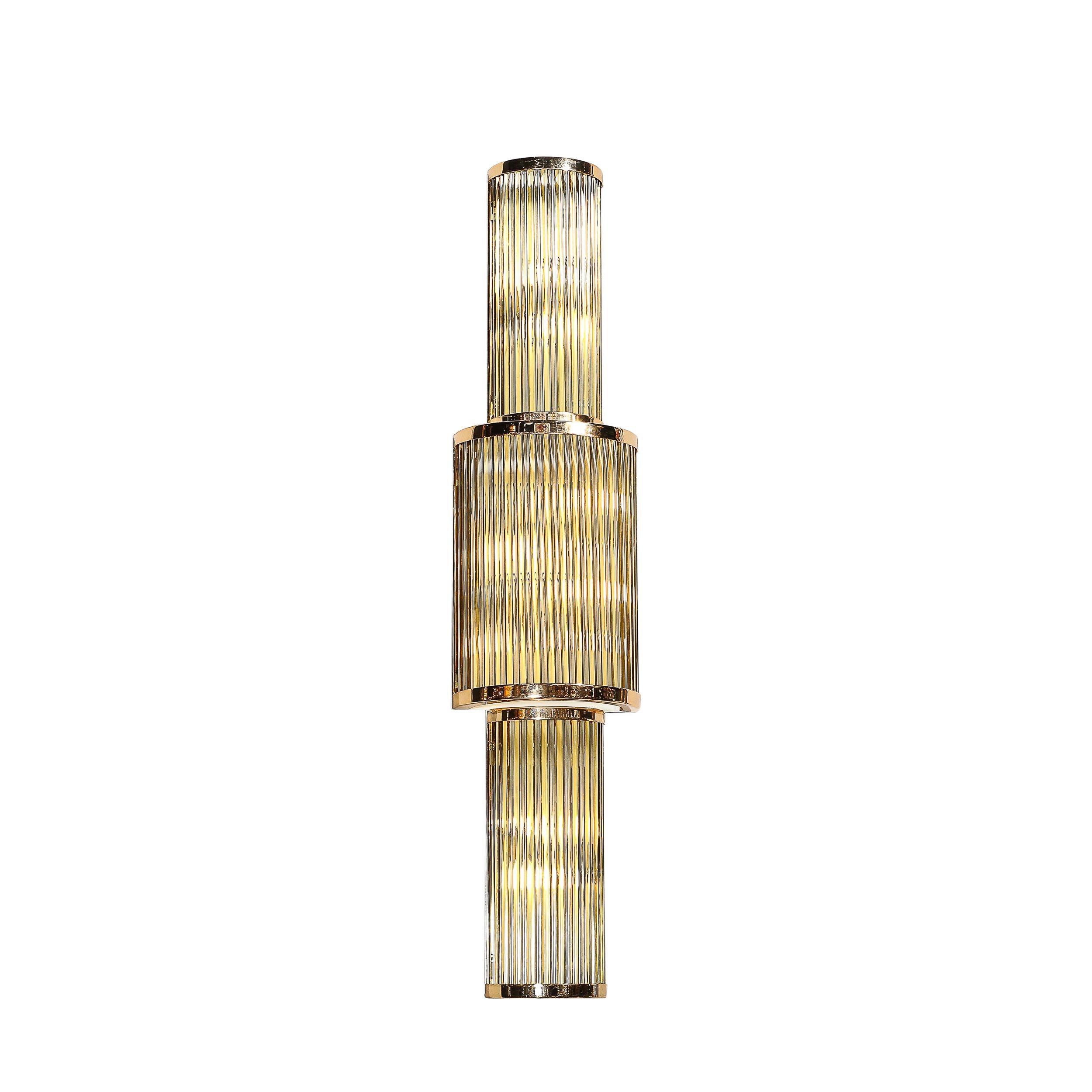 This exquisite pair of Art Deco style sconces features three tiers of hand-blown Murano mixed glass rods in clear, frosted, and amber hues. The cascading glass rods create a sophisticated display of light and shadow, evoking timeless