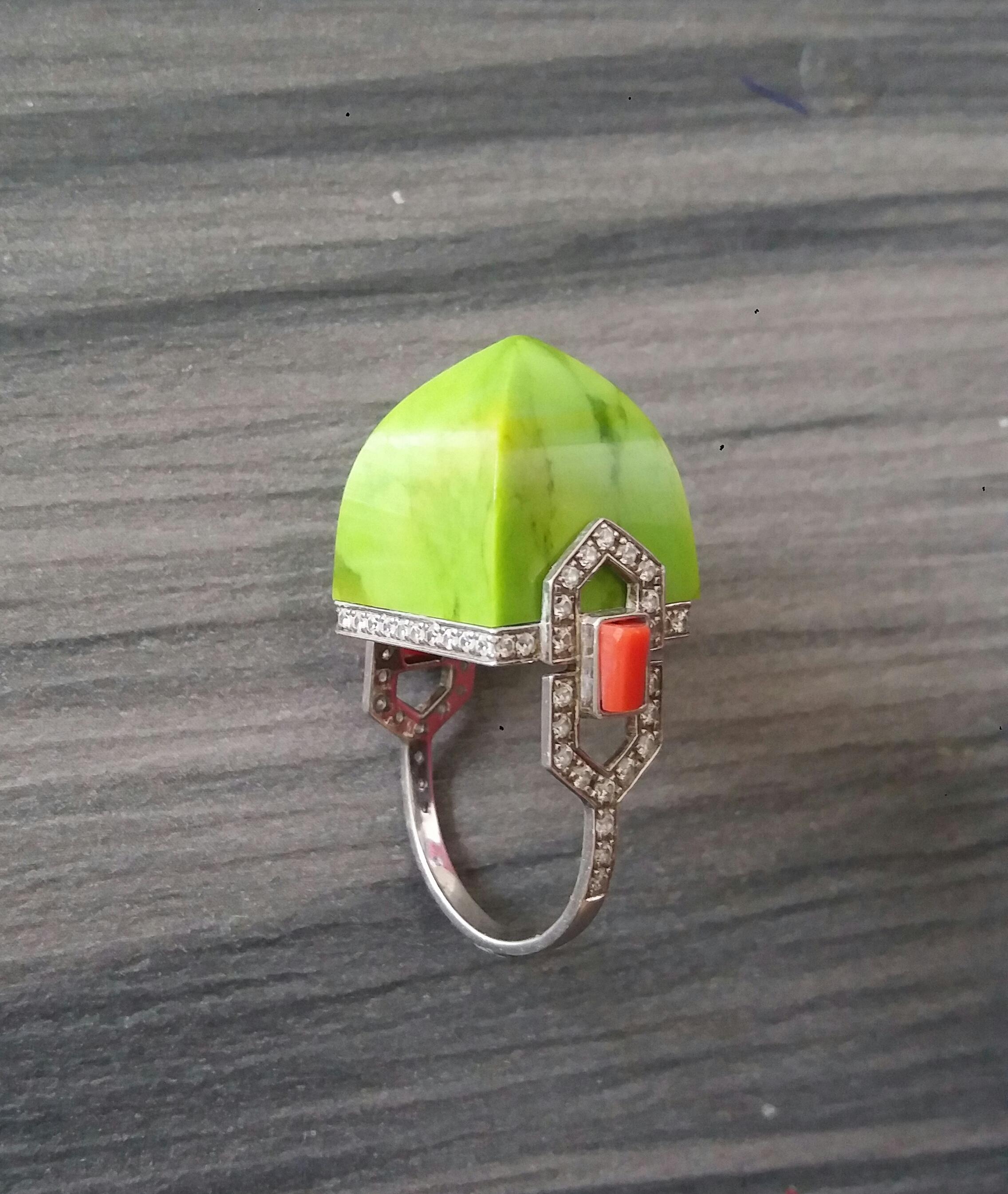 Unique and classic handmade Art Deco Style cocktail ring with a Genuine 31 Carat Green Turquoise Pyramid measuring 16x16 mm set in a 14 kt yellow solid gold mounting,including 70 full cut diamonds

In 1978 our workshop started in Italy to make
