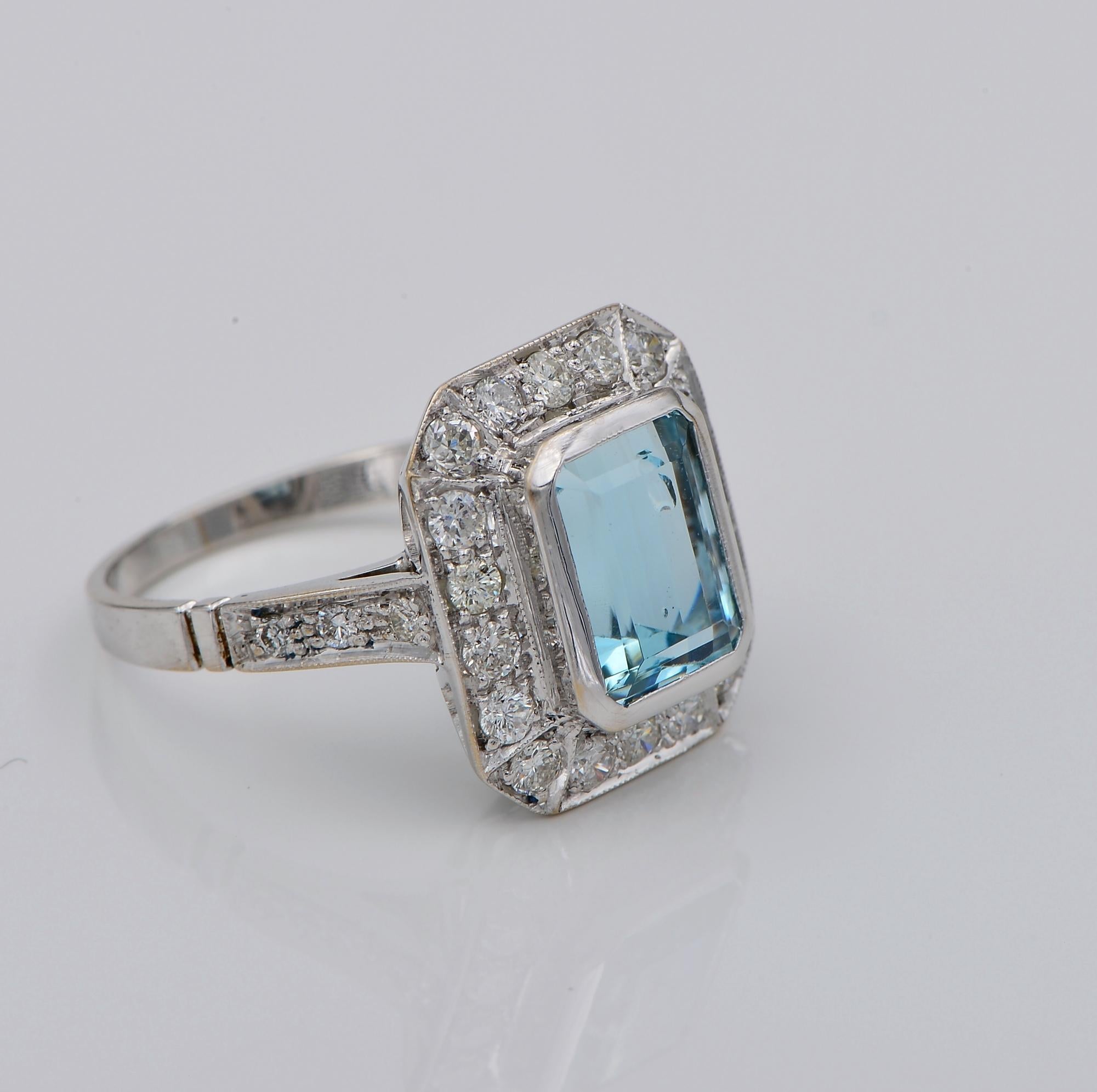 This classy vintage ring is Art deco style 1970 ca
Well hand made as unique of solid 18 Kt white gold
Beautiful octagonal shape crown given by the centre Aquamarine with a gorgeous fret work on the reverse side and rich Diamond complement
Aquamarine