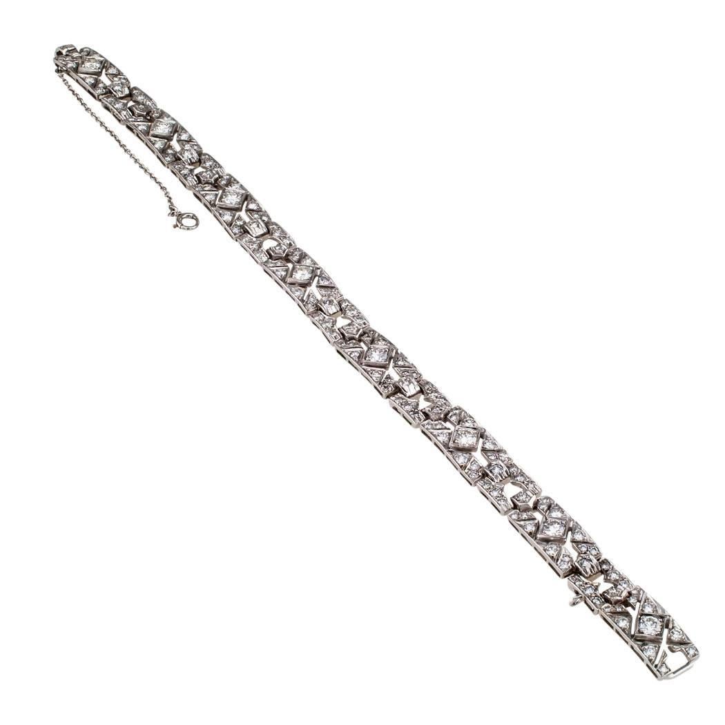 Estate 4.25 carats diamond and platinum bracelet. The design features a series of rectangular open work links set throughout with one hundred fifty-eight round brilliant-cut diamonds totaling approximately 4.25 carats, approximately G – H color and