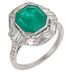 Art Deco style 4.48 carat emerald diamond platinum ring