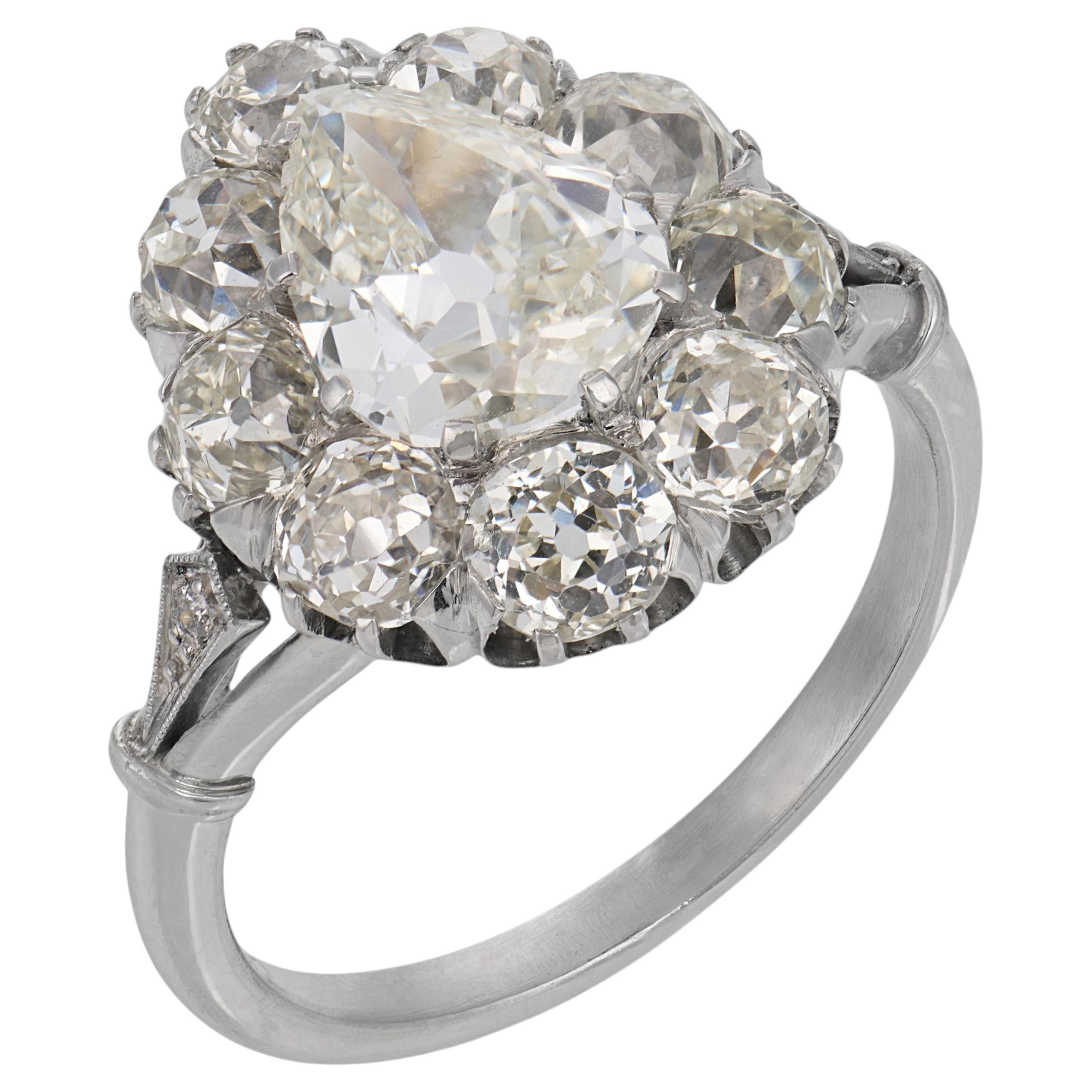 Art Deco style 4.92 carat old cut diamond platinum cluster ring