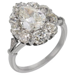 Anello a grappolo in platino con diamanti taglio vecchio da 4,92 carati in stile Art Deco