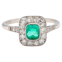 Art Deco style .54 carat emerald diamond platinum ring