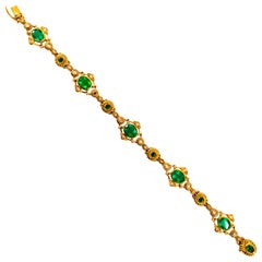 Art Deco Style 6.60 Carat Emerald 0.60 Carat White Diamond Yellow Gold Bracelet