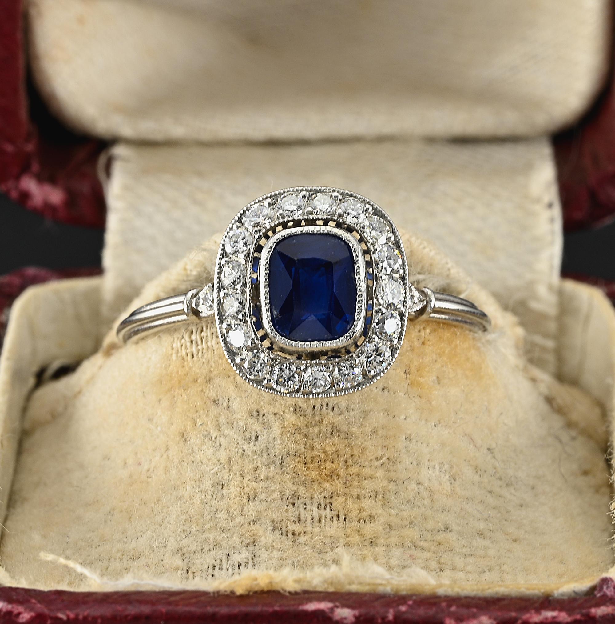 Charming Art Deco Style Platinum marked exquisite halo design is the epitome of eternal elegance
Centrally set with a vibrant velvety Blue hue oval cushion cut natural Sapphire estimate  .77 Ct. (5.9 x 4.9 mm.) weight of the Sapphire is stamped into