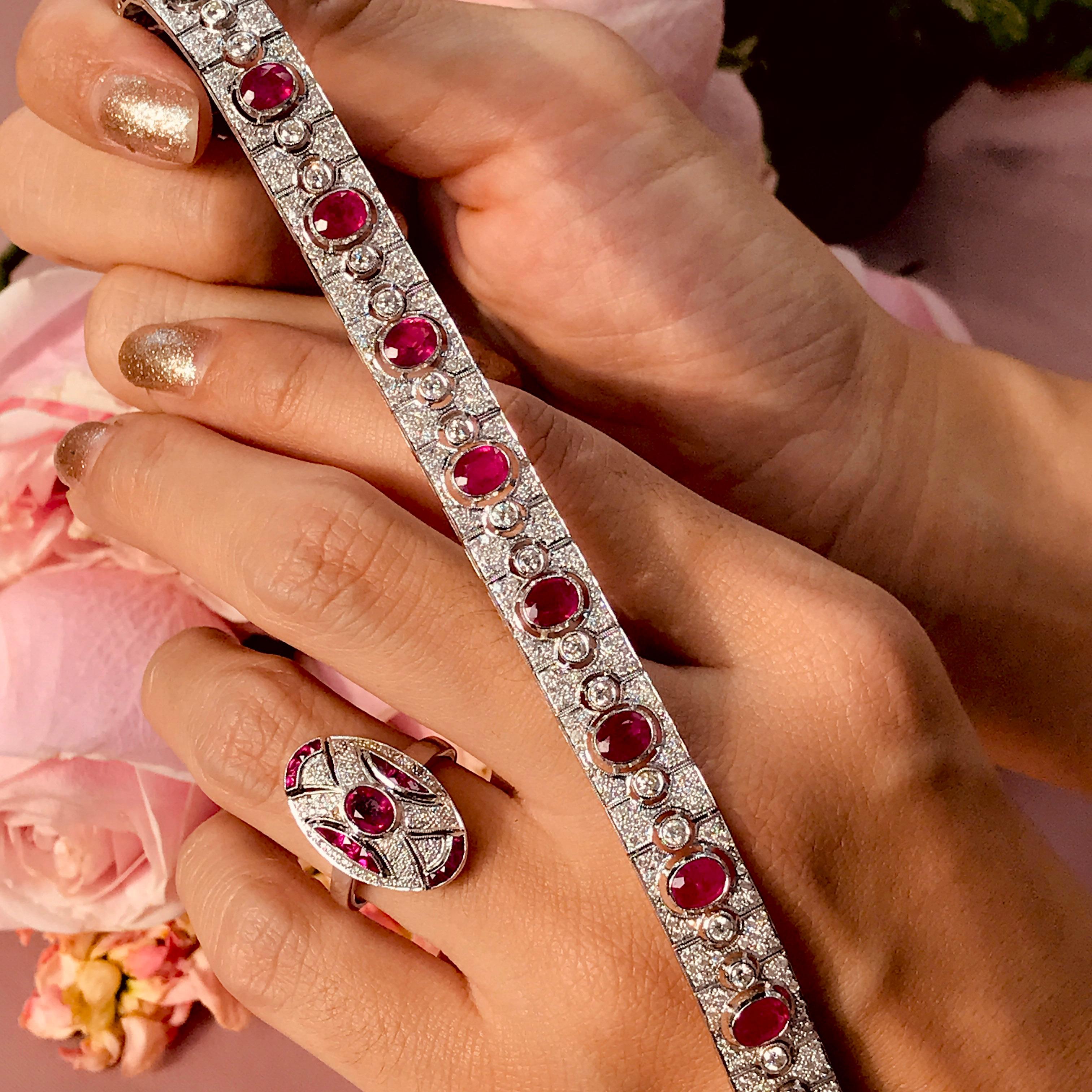 This stunning, fine and impressive antique style ruby bracelet with diamonds is crafted in 18k white gold.  The fully articulated bracelet is composed of twelve oval rubies and 384 round brilliant diamonds. This wonderful piece is a must-have for