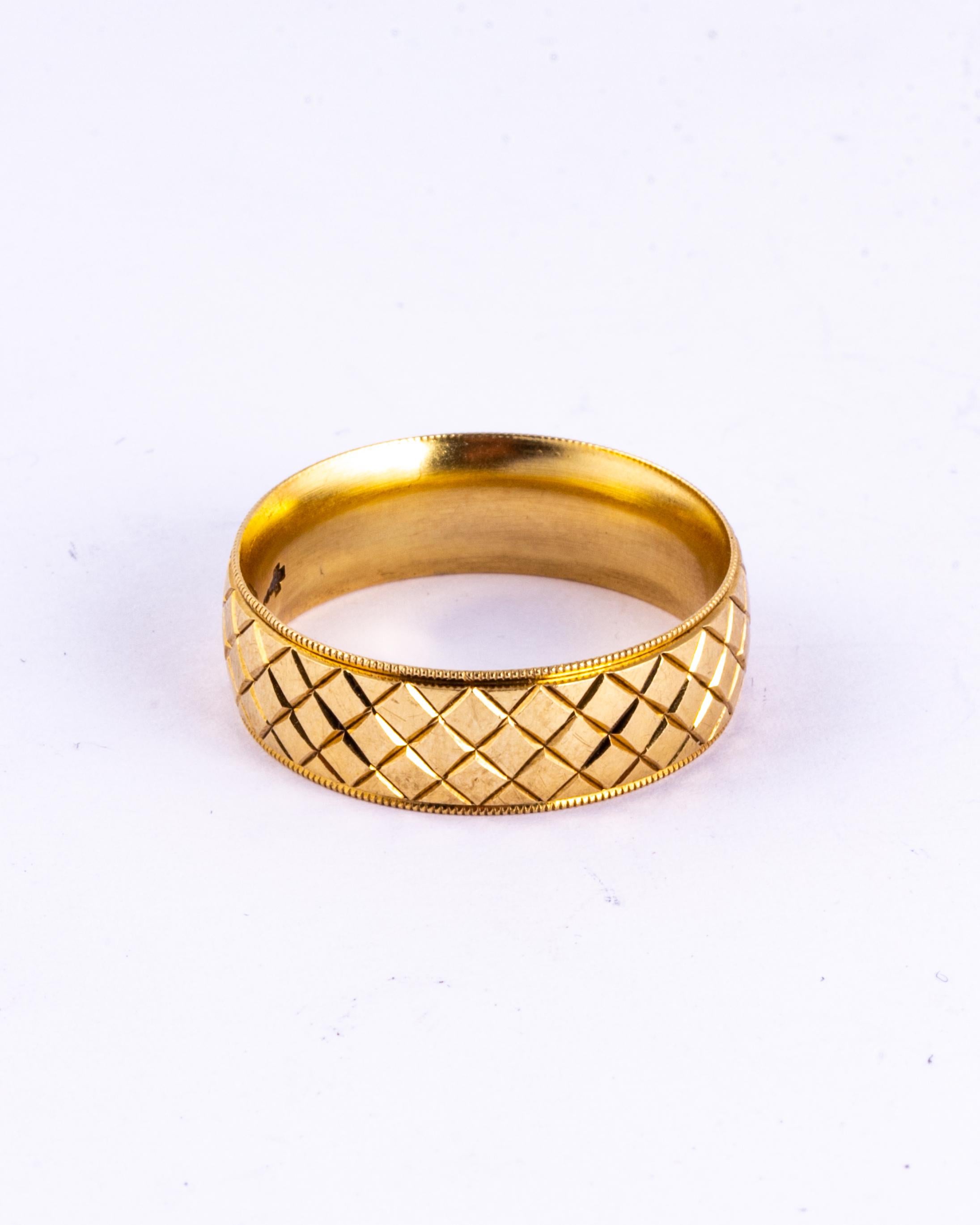 The design engraved beautifully into this 9ct gold band is full of detail. This would make a great fancy wedding band or an ornate everyday ring. Made in Birmingham, England.

Size: Z or 12 1/2
Band Width: 8mm

Weight: 8.7g