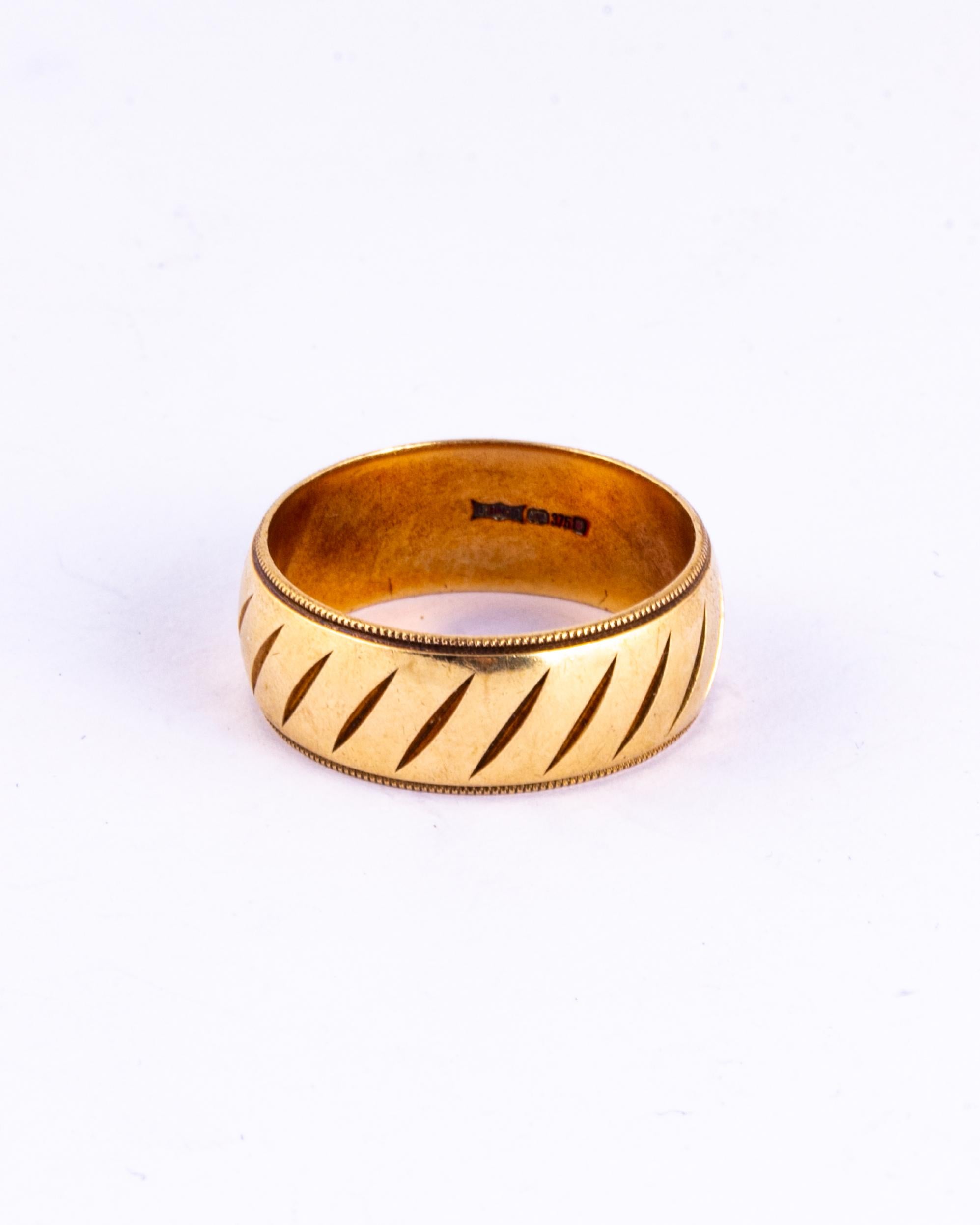 The design engraved beautifully into this 9ct gold band is full of detail. This would make a great fancy wedding band or an ornate everyday ring. Made in London, England.

Size: Y or 12 
Band Width: 8mm

Weight: 8.2g