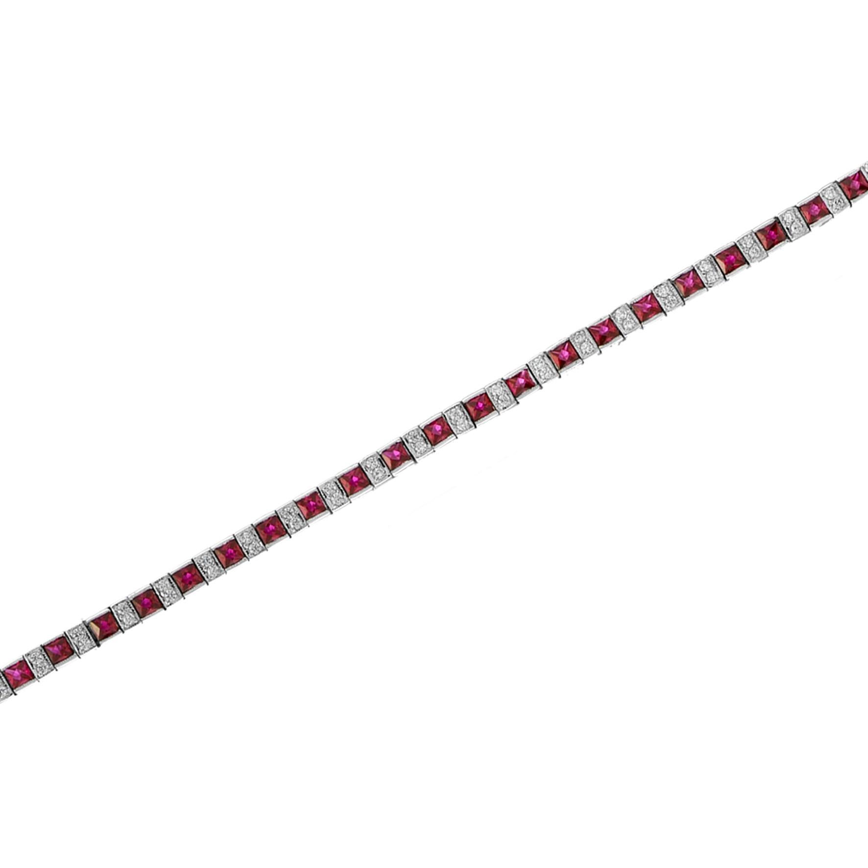 A gorgeous gemstone line bracelet from the Art Deco era!, this fabulous piece features an alternating pattern comprised of sections of ruby and diamonds. The bracelet fastens at a push clasp seamlessly hidden within the final link, and a hinged