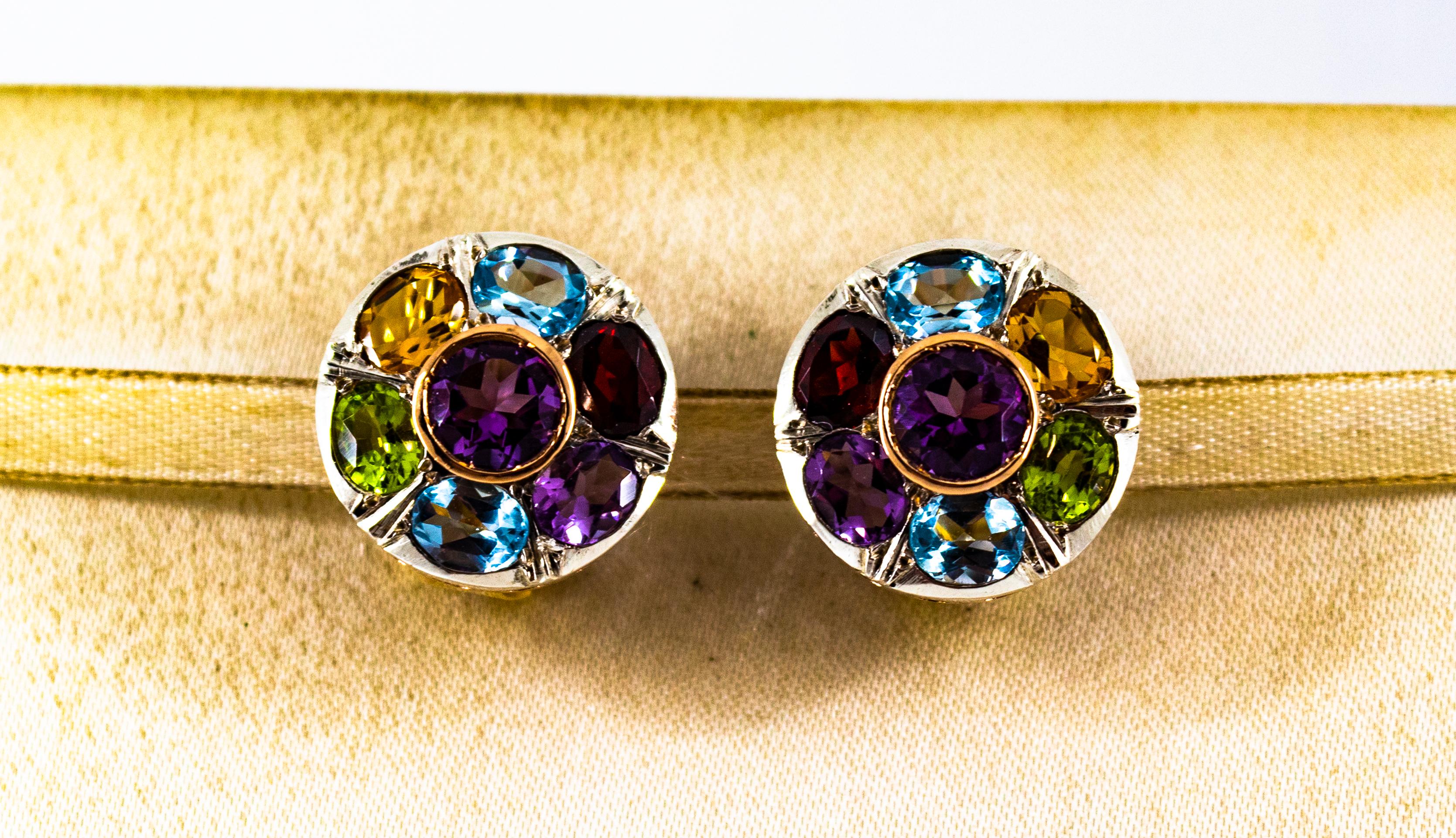 These Earrings are made of 9K Yellow Gold and Sterling Silver.
These Earrings have 12.00 Carats circa of Blue Topaz, Amethyst, Citrine, Garnet and Peridot.

These Earrings are also available in a bigger version.
These Earrings are available also in