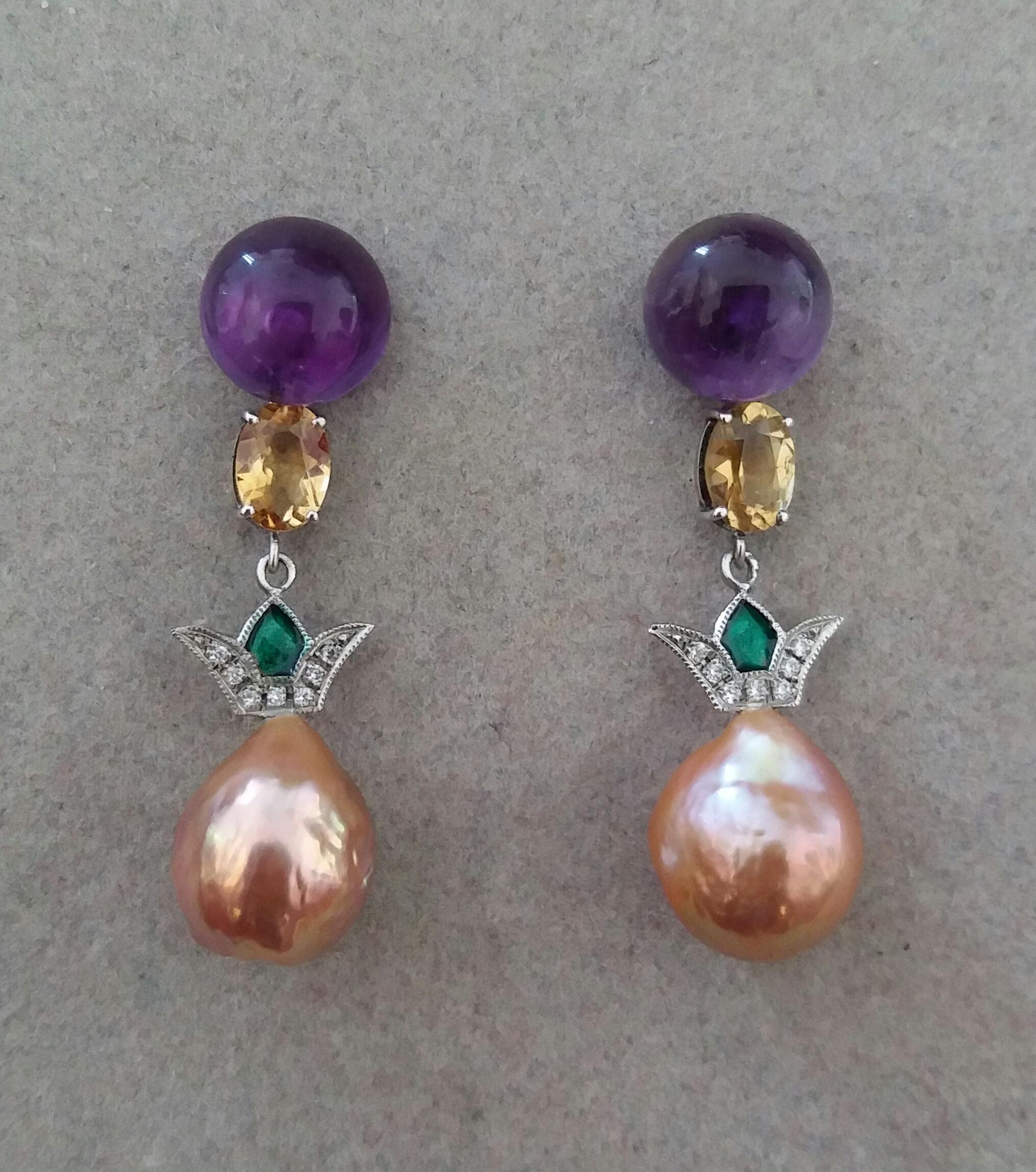 In these Art Deco Style earrings the upper parts are composed of 2 amethyst round buttons 10 mm in diameter. from which are suspended  2 oval faceted Citrines and 2 elements in white gold ,14 full cut round diamonds and green enamel, at the bottom
