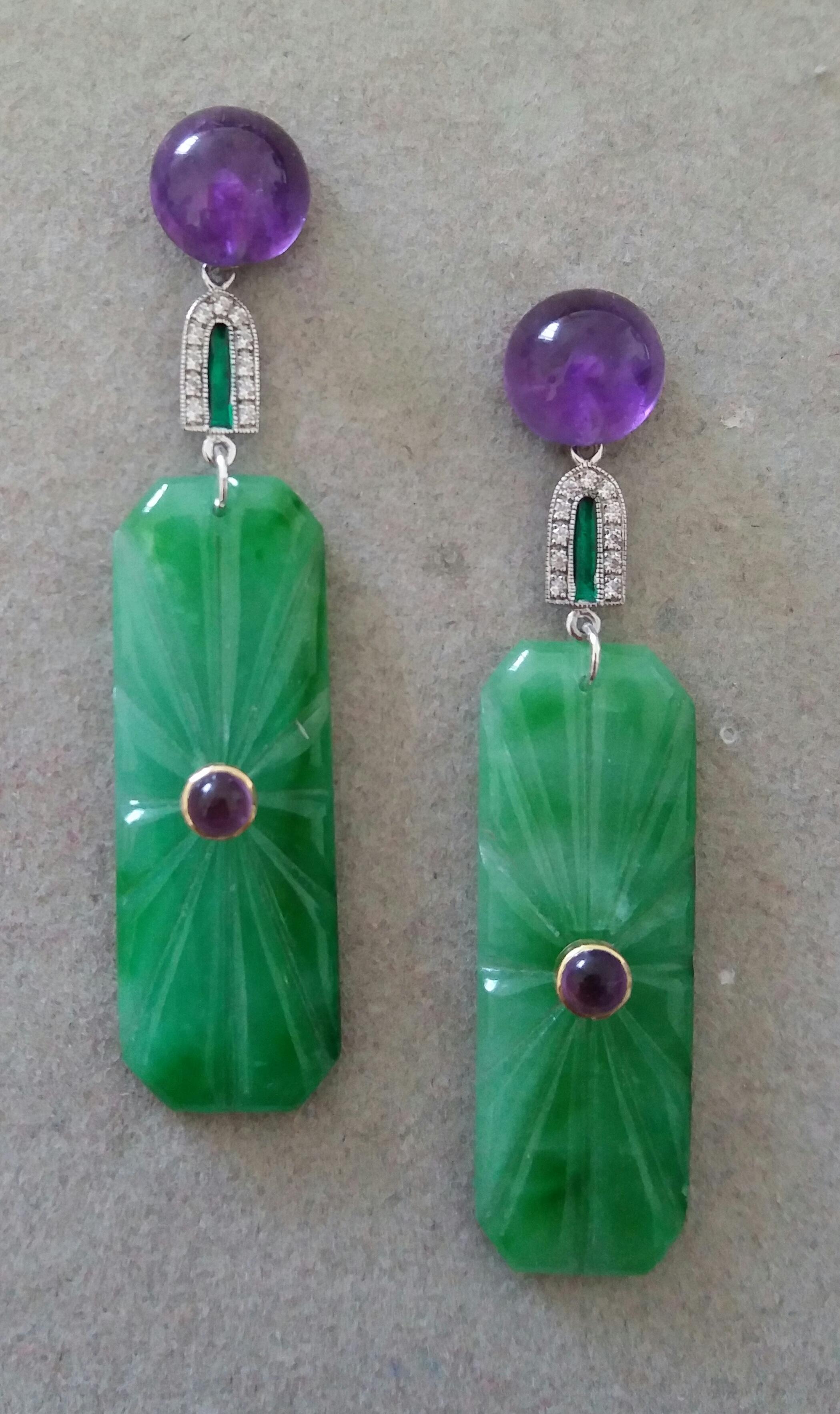 These unique earrings have 2 Amethyst round buttons of 10 mm in diameter on top,  supporting  2 elements in white gold 22 full cut diamonds and green enamel, to which finally are suspended  2 Engraved Jades in octagon shape size 13 x 40 mm. with 2