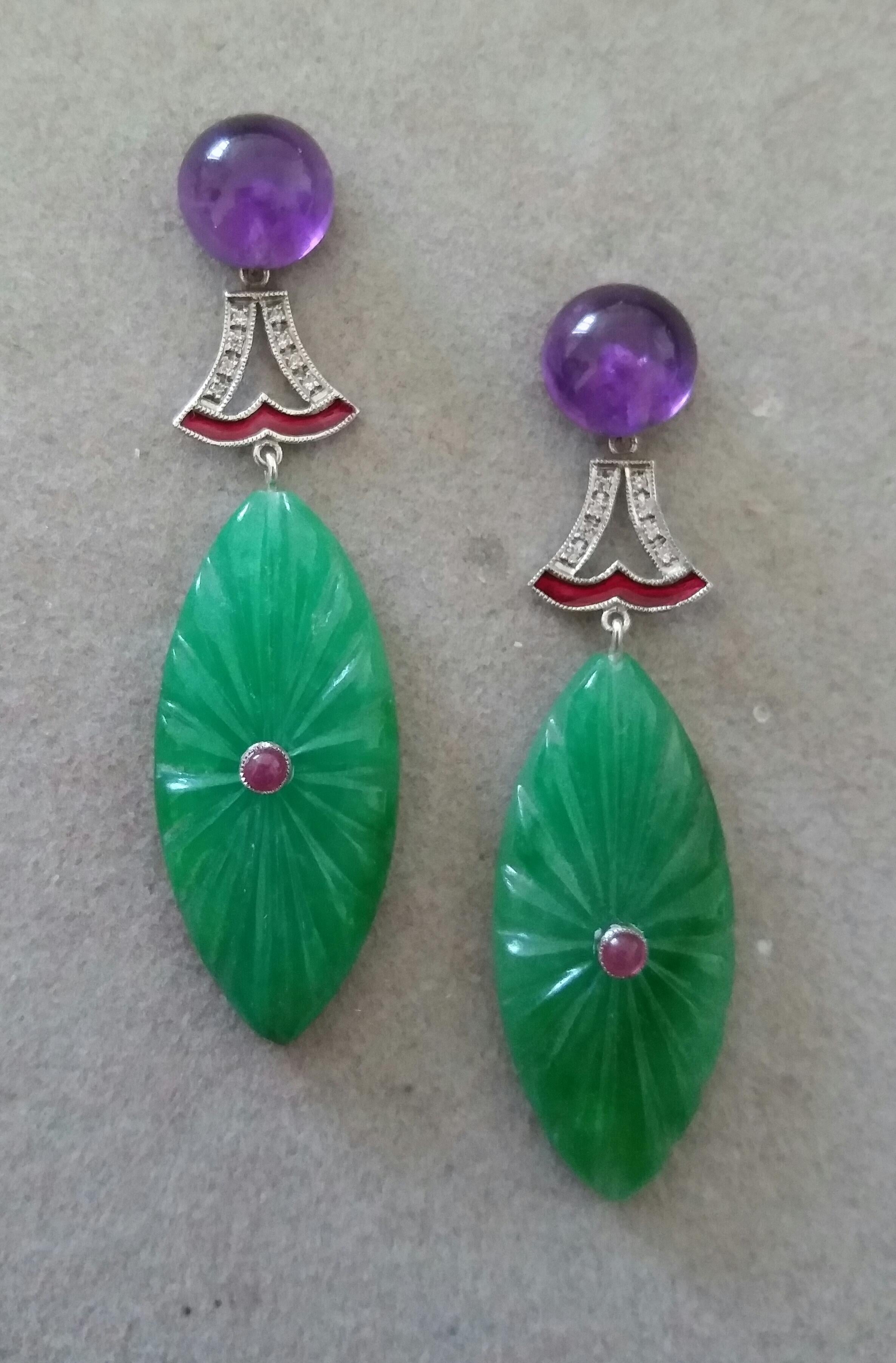 These unique earrings have 2 Amethyst round buttons of 10 mm in diameter on top,  supporting  2 elements in white gold 16 full cut diamonds and red enamel, to which finally are suspended  2 Engraved Jades in marquise shape size 15 x 35 mm. with 2