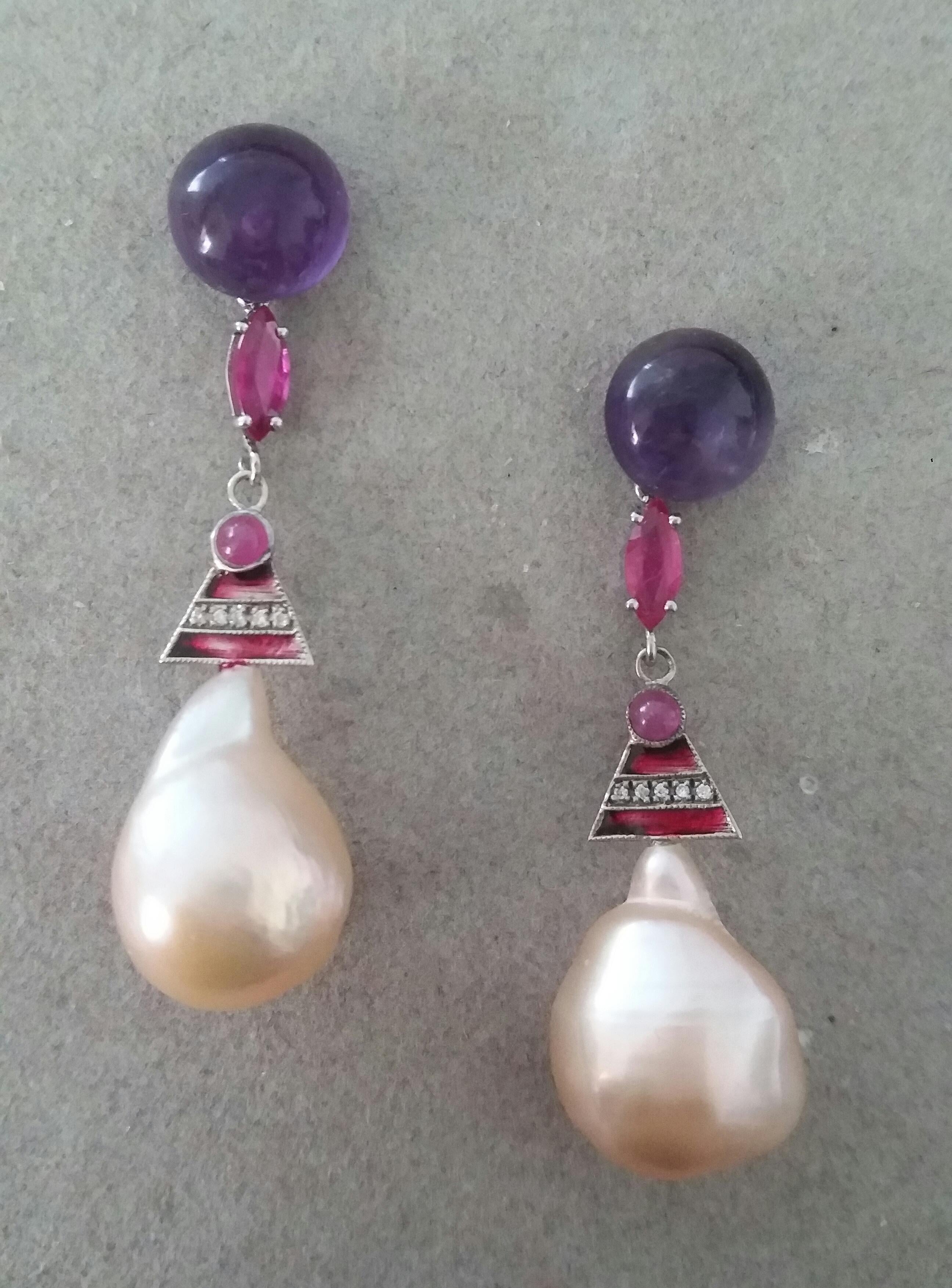 In these Art Deco Style earrings in the upper part we have 2  round Amethyst cabochons measuring 10 mm in diameter, the central part is composed of 2 elements in 14 kt white gold ,10 full cut diamonds ,rubies  and red enamel, in the lower part we
