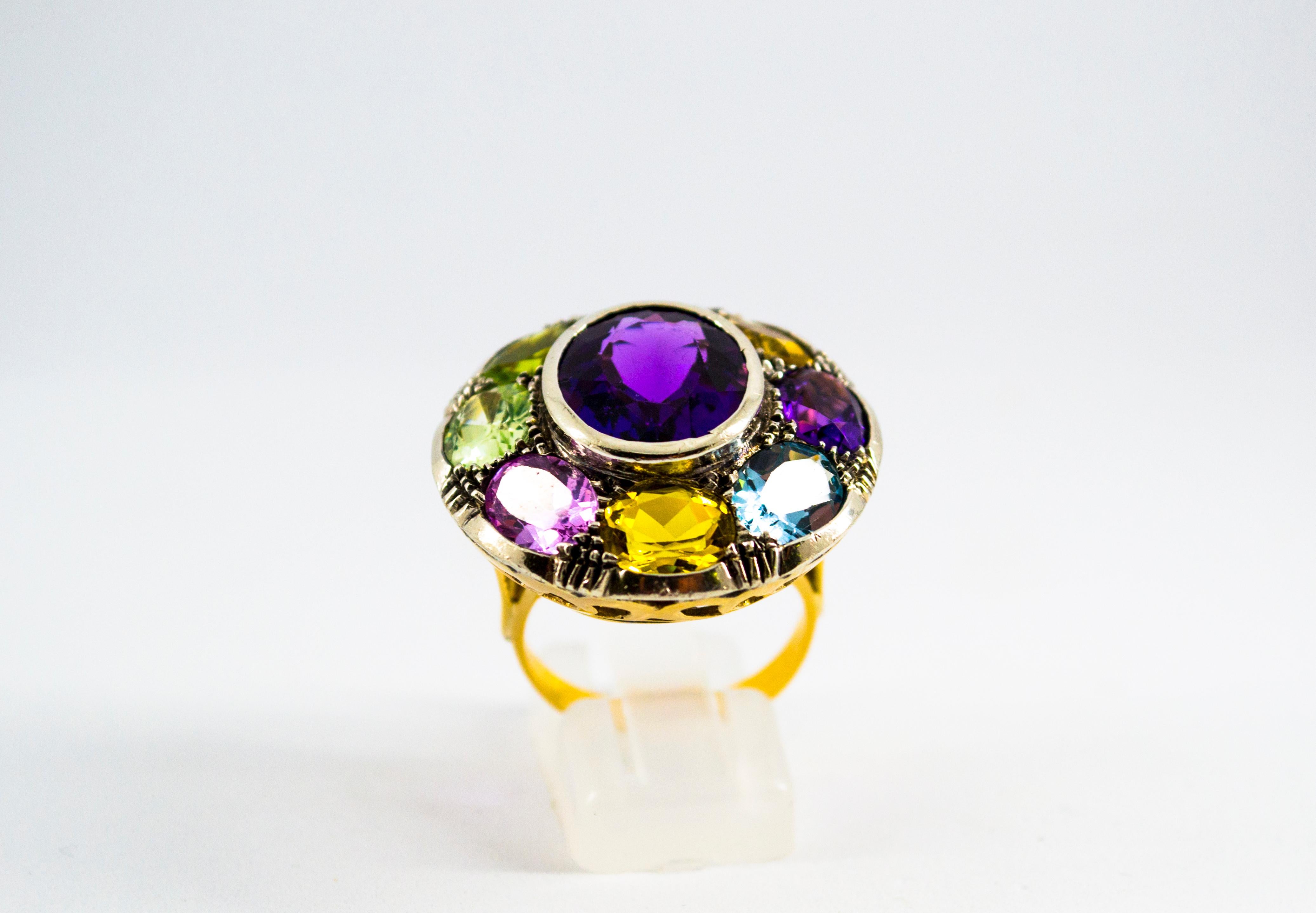 This Ring is made of 9K Yellow Gold and Sterling Silver.
This Ring has Amethyst, Peridot, Citrine, Lemon Quartz, Blue Topaz.
This Ring is inspired by Art Deco.

Size ITA: 18 USA: 8 1/4

We're a workshop so every piece is handmade, customizable and