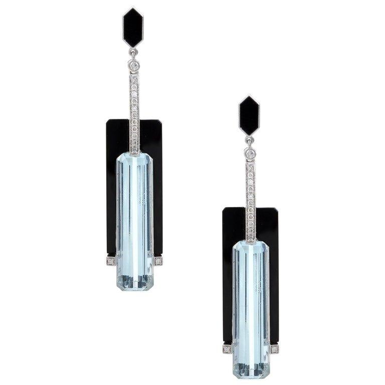 ART DECO STYLE AQUAMARINE DIAMOND ONYX DROP EARRINGS
by Cartmer Jewellery
Valuation Certificate supplied

Each drop comprising an emerald cut aquamarine of 11.75cts, to a an onyx plaque and fitting, with diamond detail, mounted in 18ct white gold.