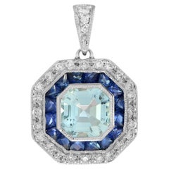 Art Deco Style Aquamarine with Sapphire and Diamond Halo Pendant in 14K Gold