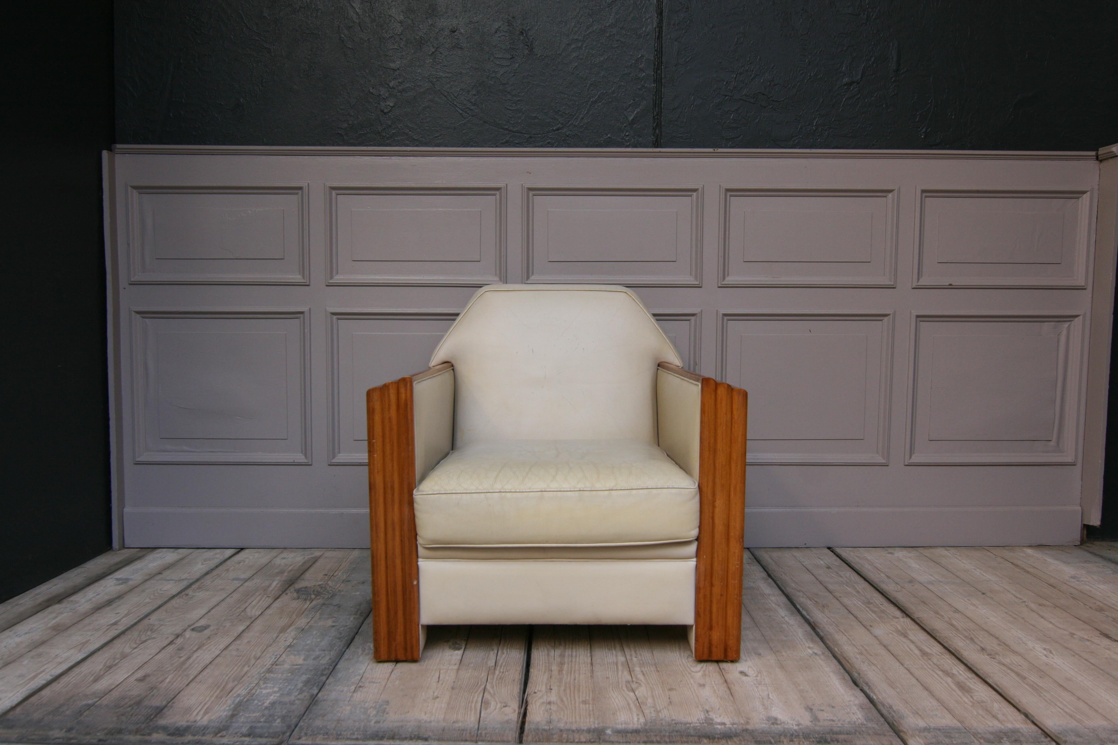 Original armchair in Art Deco style by Hugues Chevalier from Paris. Beechwood frame and leather cover.
The brand name 