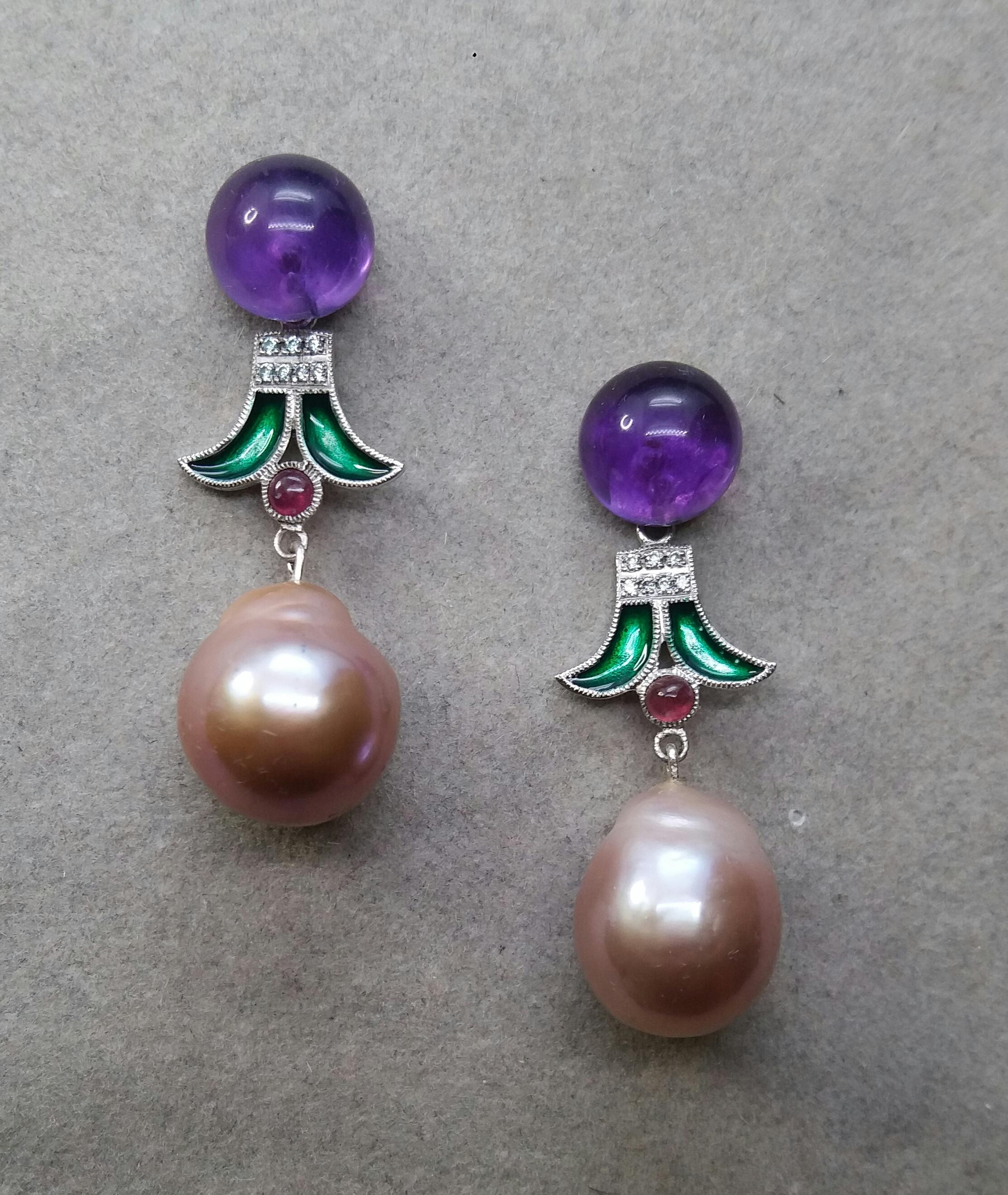These unique earrings have 2 Amethyst round buttons of 10 mm in diameter on top,  supporting  2 elements in white gold , 14 full cut diamonds,small round Ruby cabs and Green Enamel, to which finally are suspended  2 Natural Cream Color Baroque