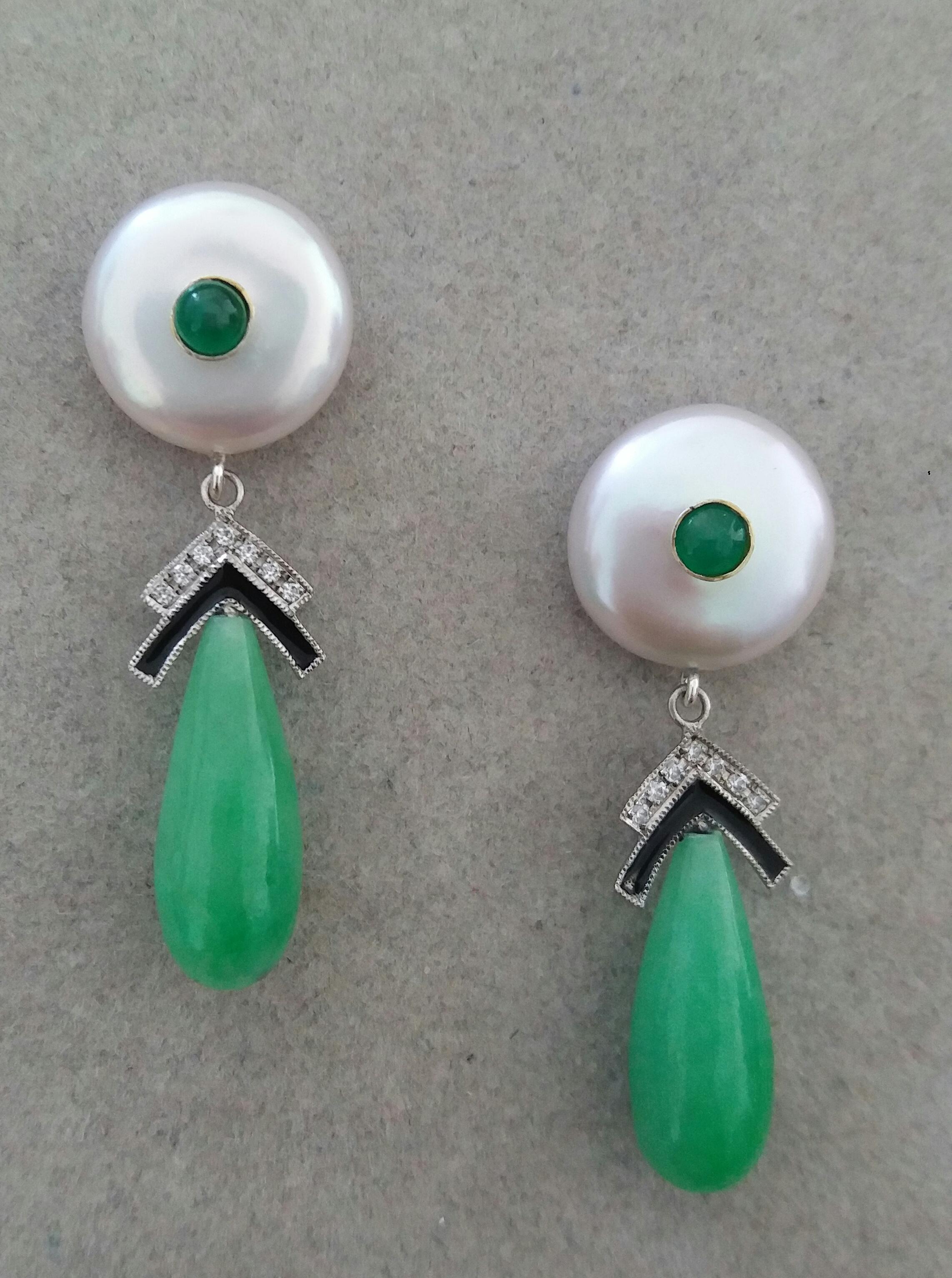 Classic Art Deco Style earrings with the top with 2 round flat Fresh Water pearls 14 mm in diameter with small round emerald cabs in the center,middle parts are composed of 2 white gold elements , 14 full cut  round diamonds and black enamels,2 Jade
